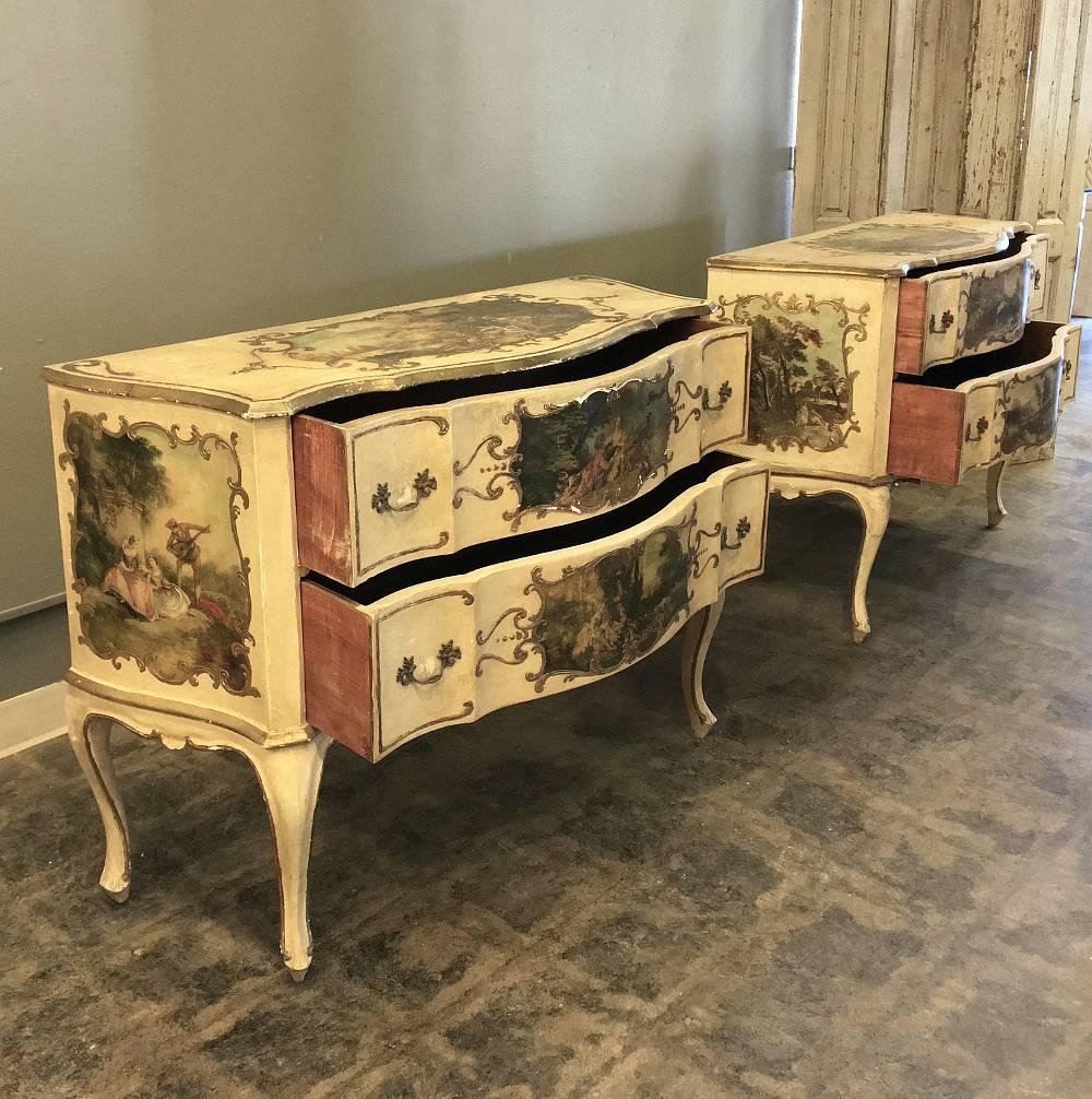 Resplendent with 10 (yes, ten!) original hand-painted works of Art on all facades, this stunning pair of antique Venetian serpentine painted commodes are truly remarkable to behold! The scroll-shaped sides creating the serpentine effect flank the