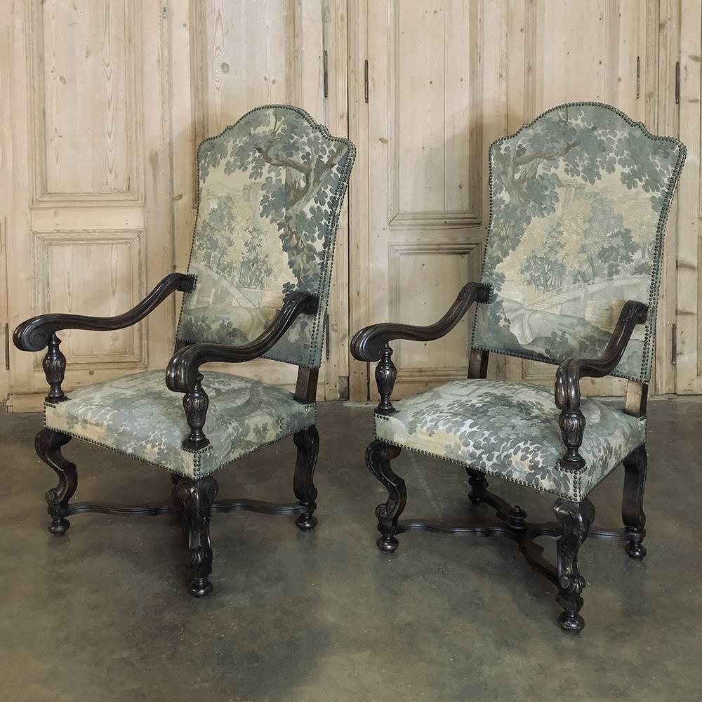 Pair of 19th century French Louis XIV armchairs with Aubusson tapestry are a rare find indeed! The original hand-knotted Aubusson tapestry is in fine condition and covers the entire seatback and seat, secured into place with brass tacks to follow