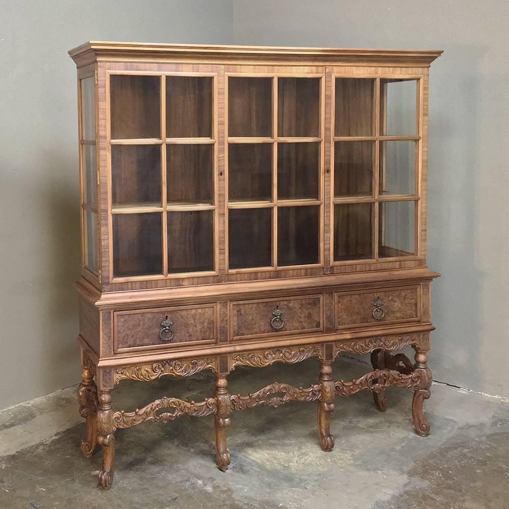 Dutch Renaissance Vitrine bookcase by H. Pander & Sons from Amsterdam is perfect for displaying and storing books, a collection, or seasonal displays! Standing only 15 inches out from the wall, it's great for high-traffic areas, as well. Raised