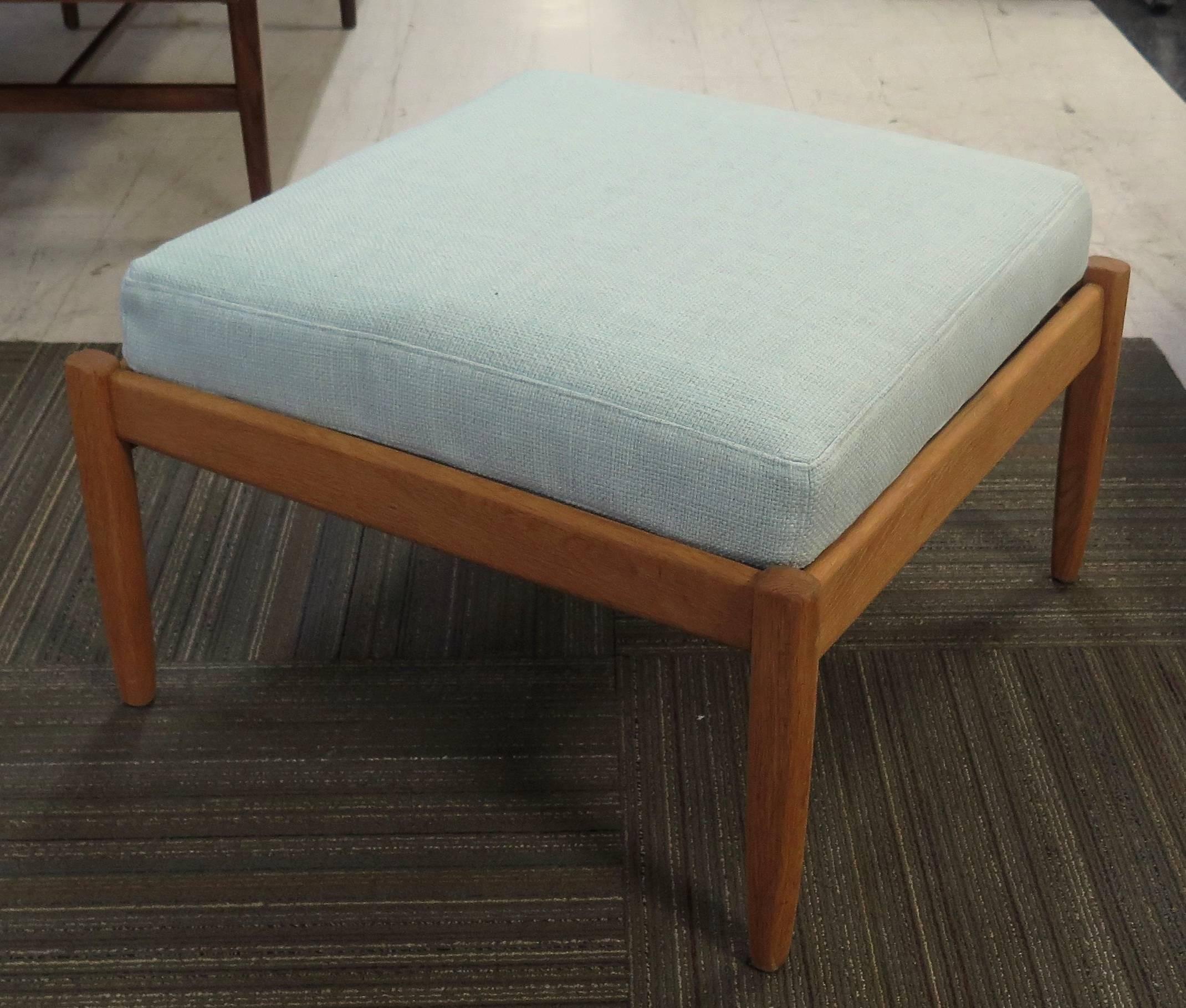 Nice set of stacking ottomans. Oak frames. All with new strapping, foam and fabric. Fabric color is Aruba by Greenhouse Fabrics. Could also be configured with all three together as bench seating.

