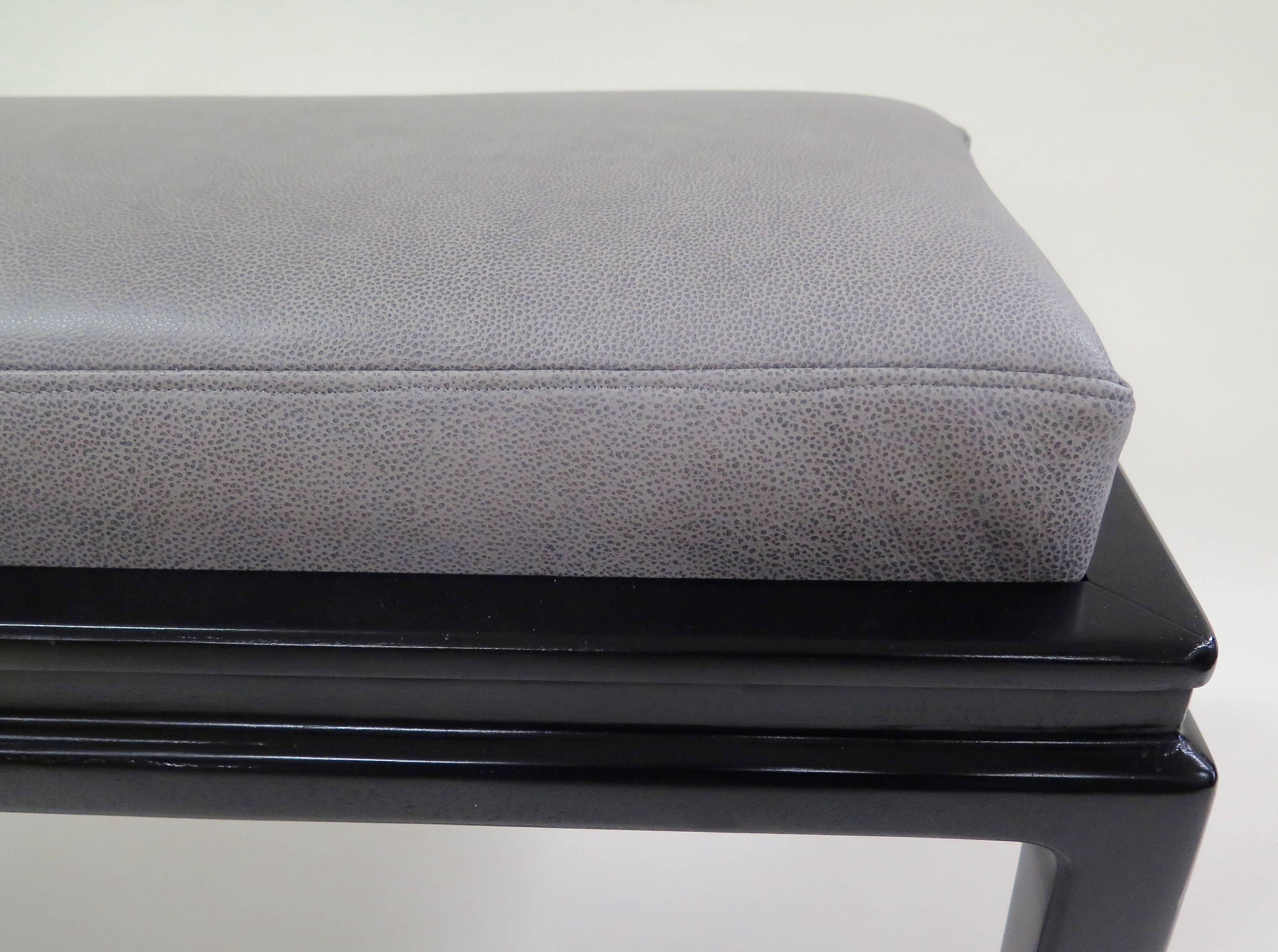 Signed and numbered 4525. New grey leather. New black lacquer. A great narrow bench with Asian-influence design.