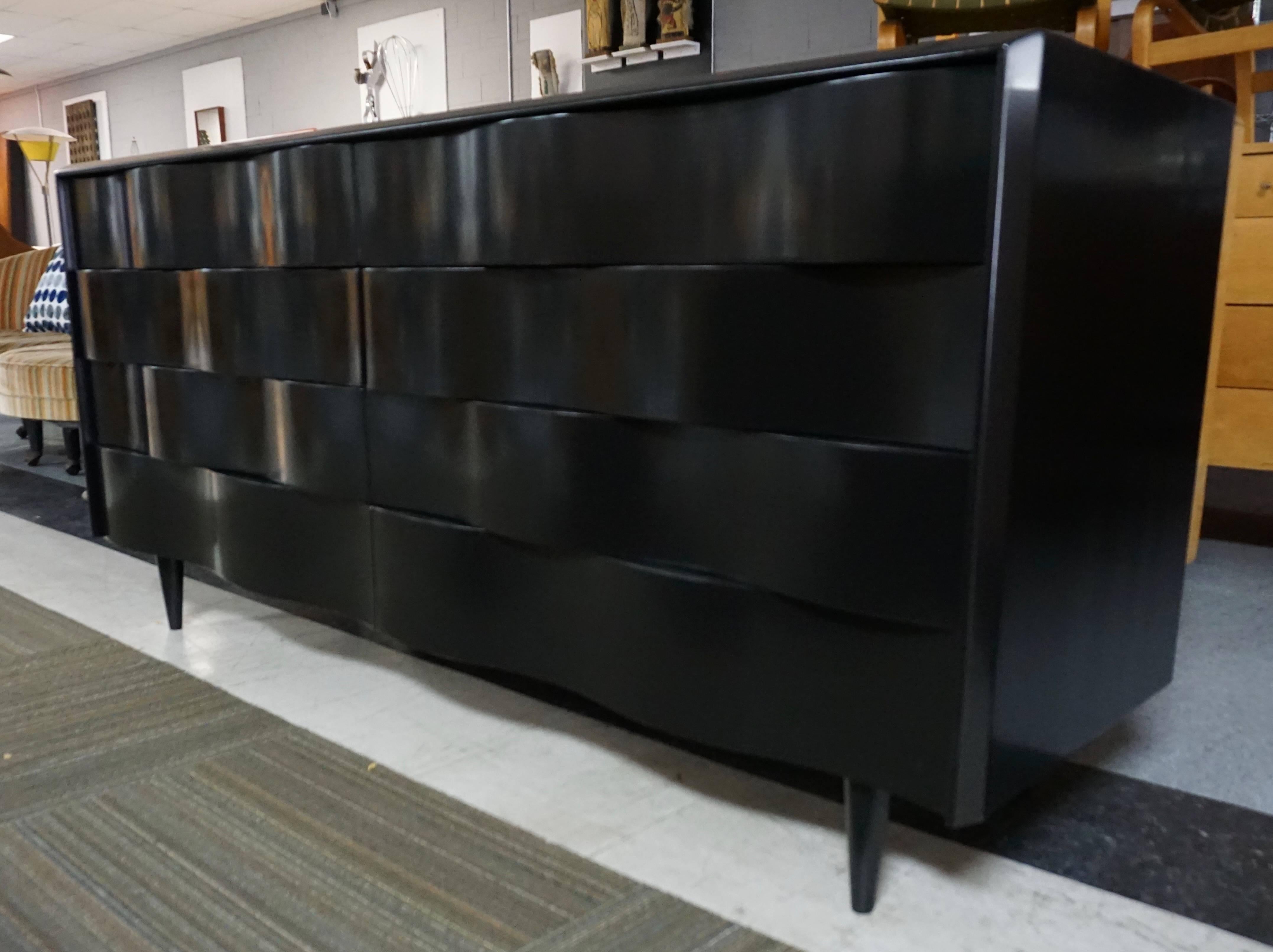 All redone with six coats of black lacquer. Eight drawers. Insides of drawers are very nice. Made in Sweden.