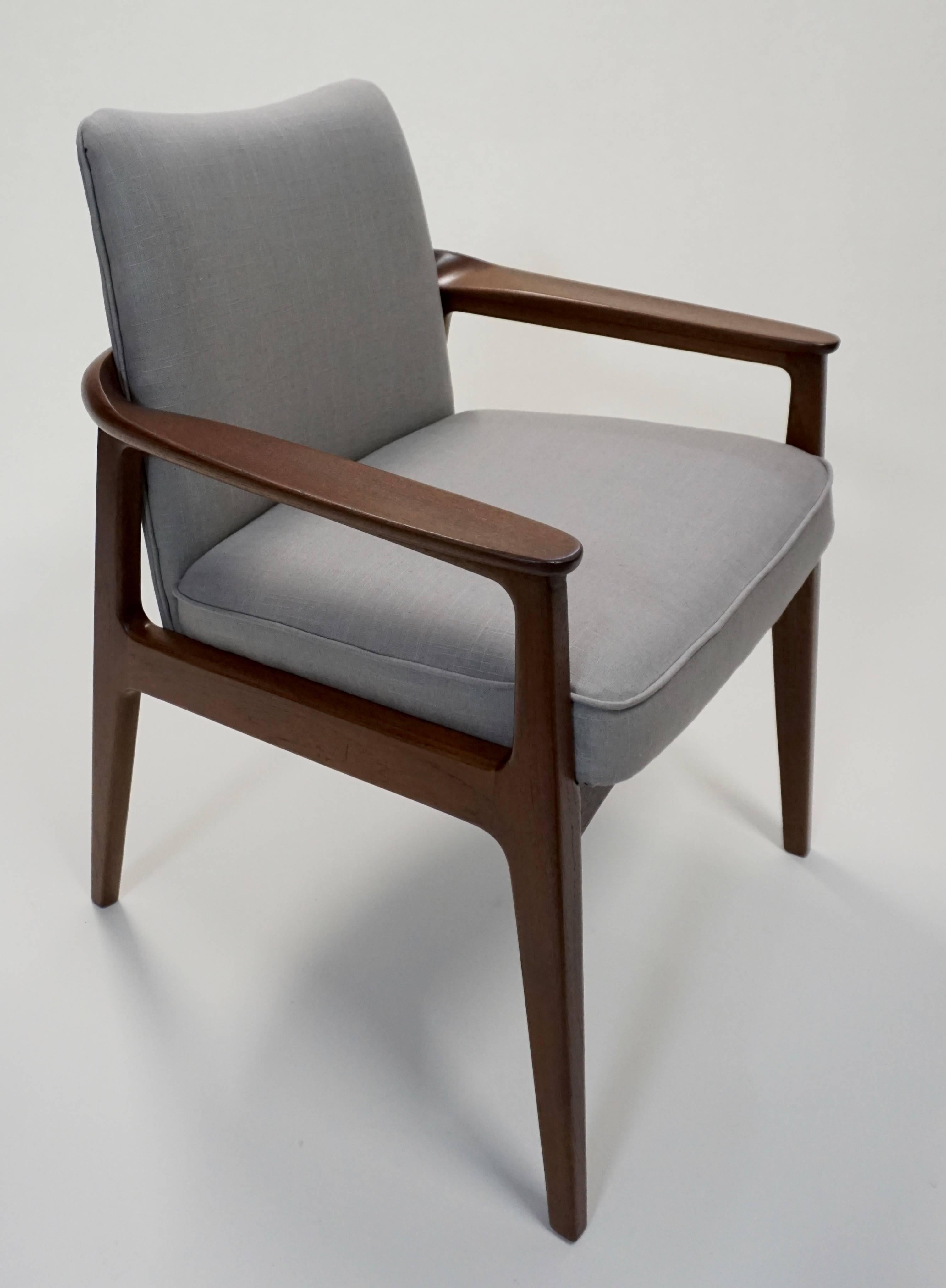 Restored. Teakwood construction. All new upholstery in Belgian linen (Ash), by Greenhouse Fabrics. 3 labels.