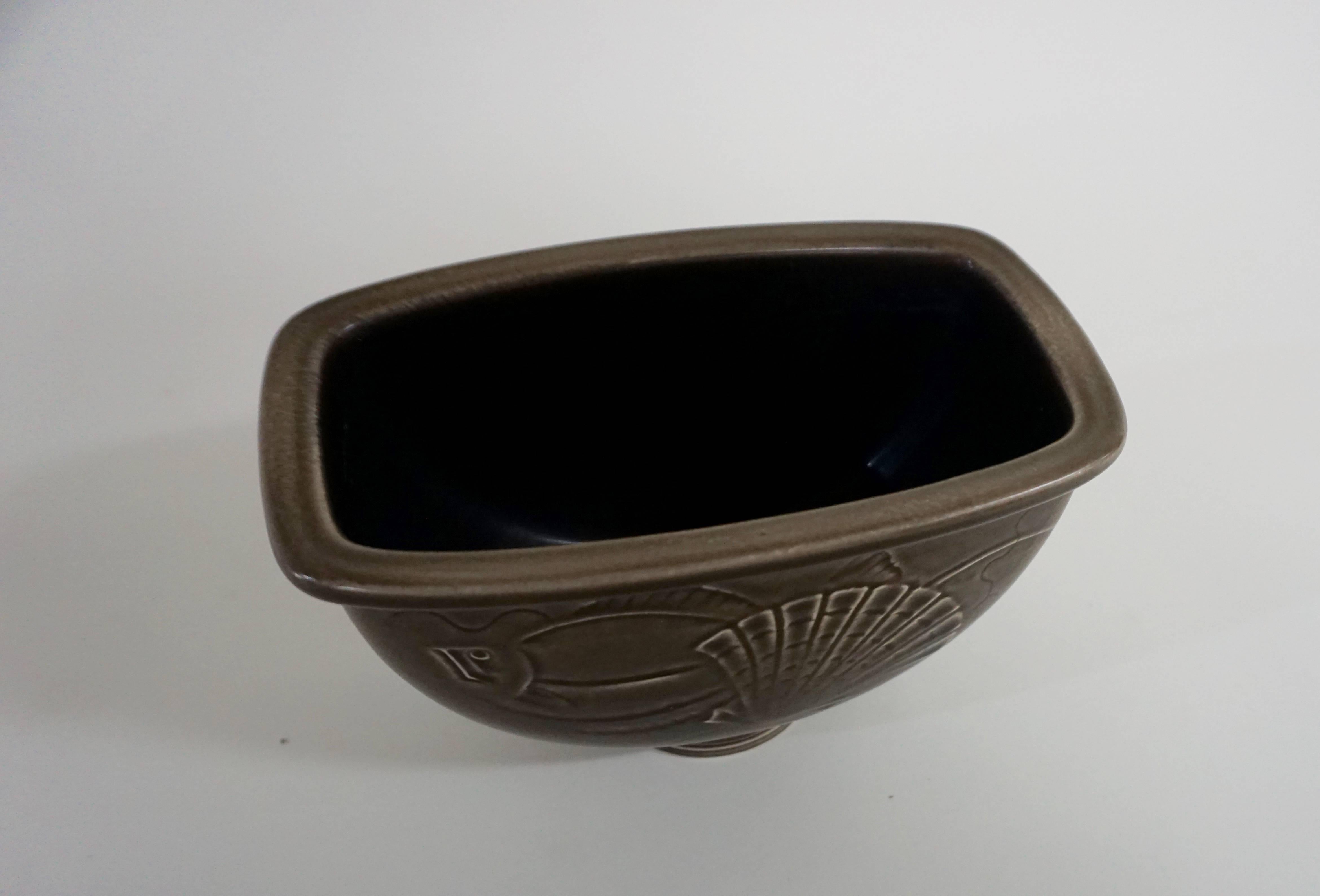 Labeled. Design by Nils Thorsen. Motif on front and back. Brown glaze. No chips or cracks.