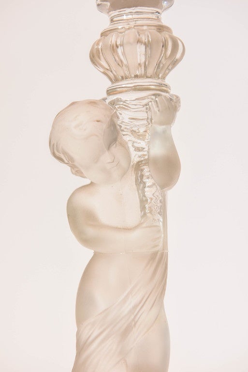 20th Century Pair of Baccarat Crystal Frosted Base Cupids Holding a Candlestick