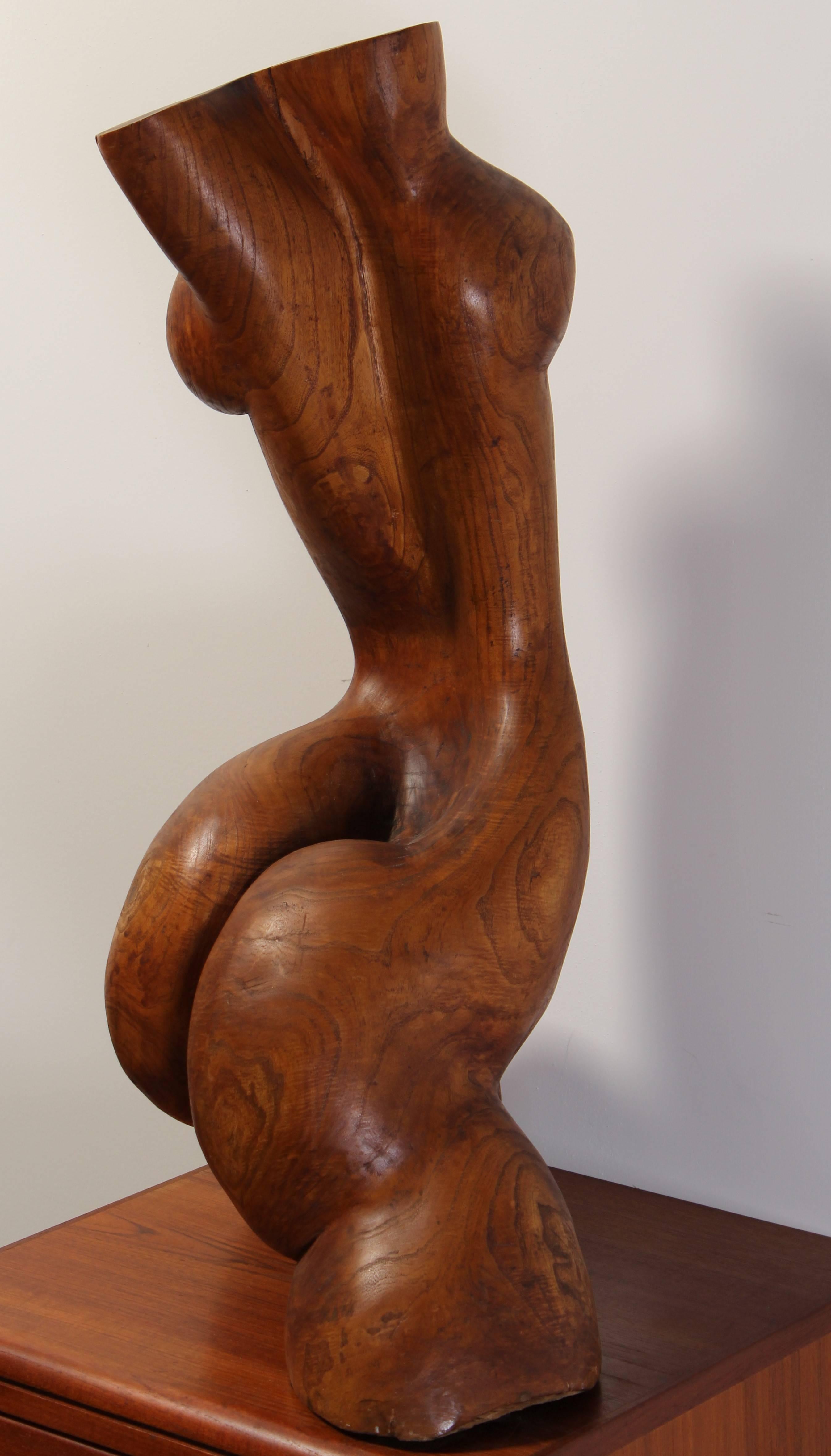 An exquisite artist made, burled hard wood, hand-carved sculpture in the manner of Aristide Maillol. Although unsigned, the artist put a lot of work into this provocative interpretation of a nude woman's torso. This piece was well thought out in the