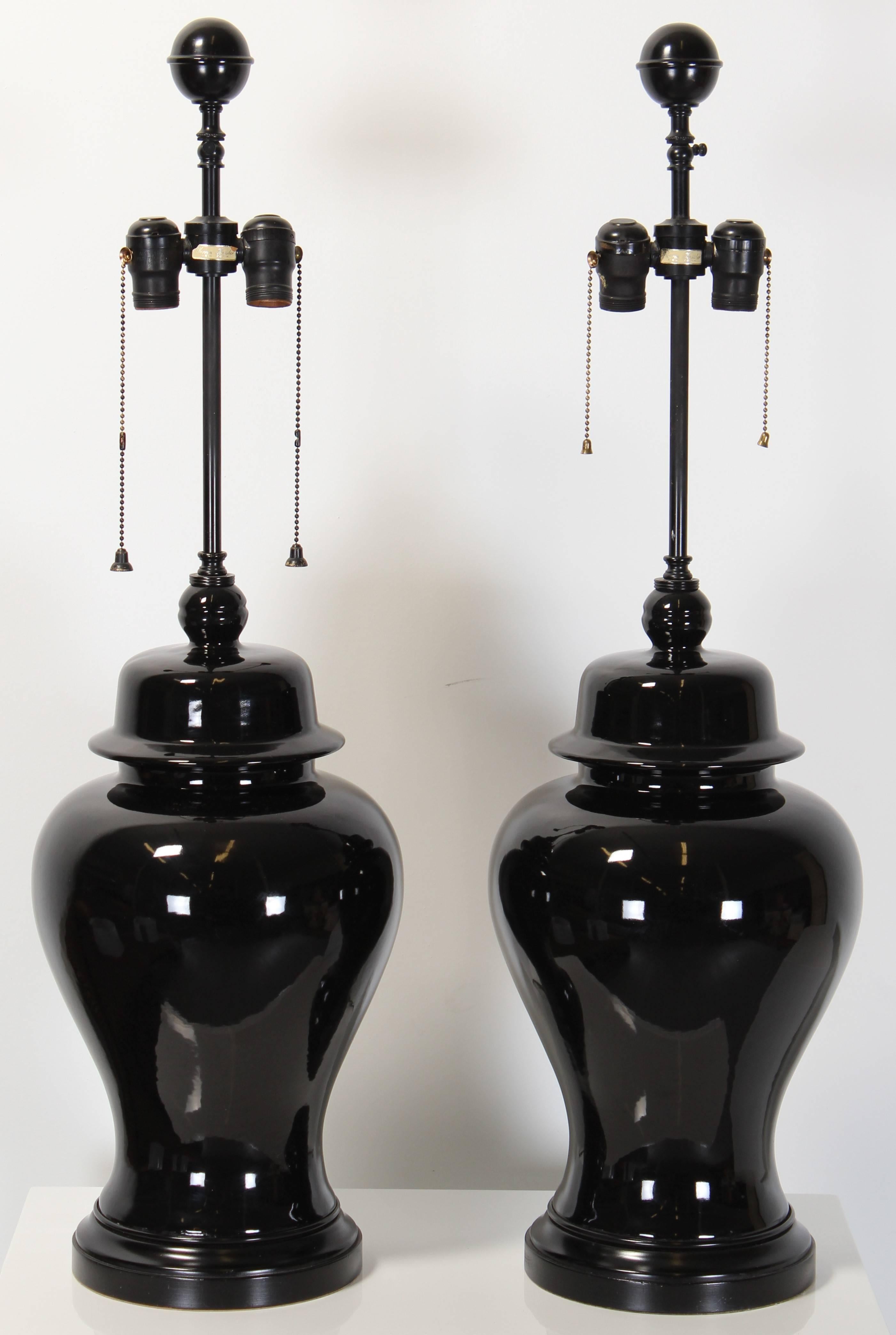 A pair of Mid-Century Modern ginger jar form table lamps, in very good condition. Vintage sockets and wiring needs to be updated.
 In 1939 Warren Kessler built a factory on the site of the Feuchsel Pickle Works, located north of the railroad tracks,