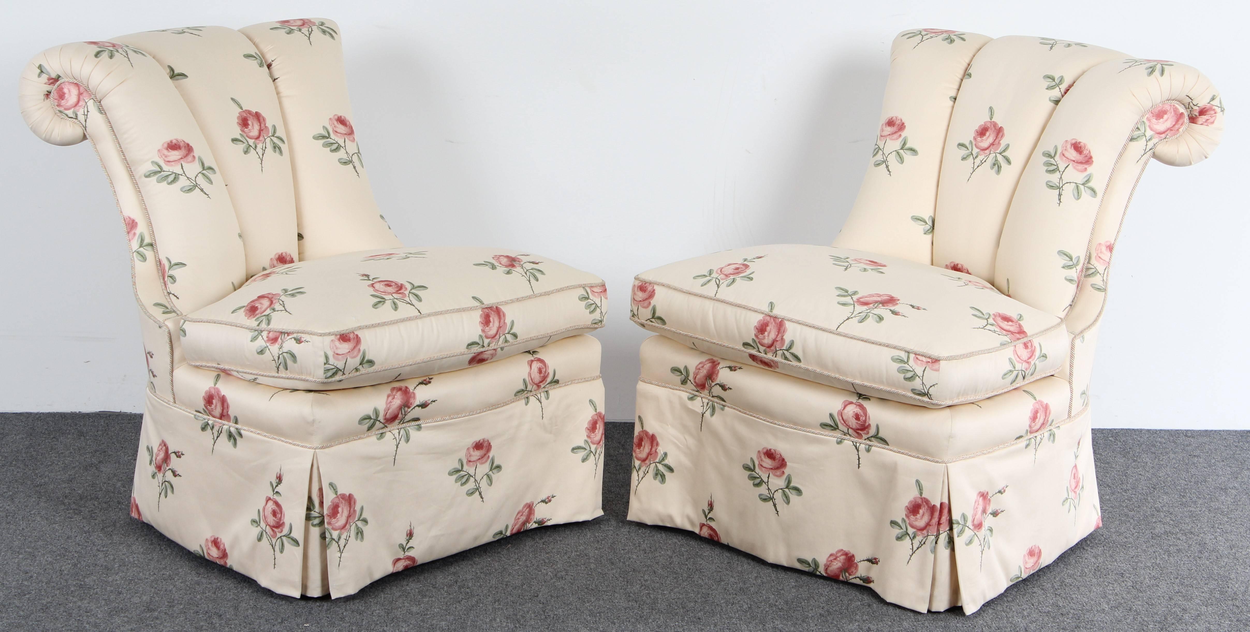 Pair of armless Napoleon III slipper chairs by Lewis Mittman, Inc. The high quality chairs have original floral chintz upholstery. These comfortable Hollywood Regency style chairs would look great in any modern or traditional home. They have great