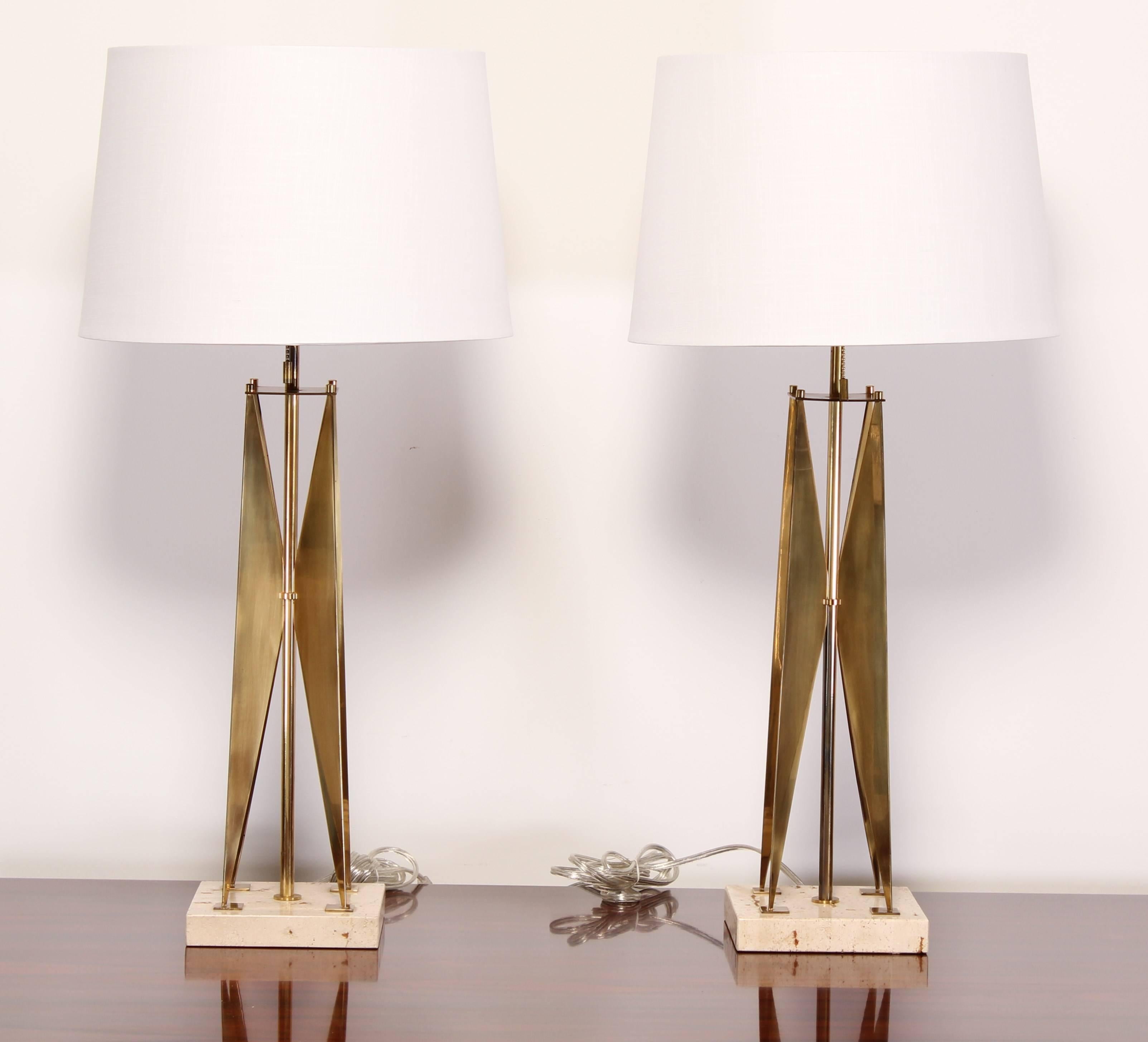 An elegant pair of Gerald Thurston style brass and travertine marble lamps, 1970. Shades available if desired, 15