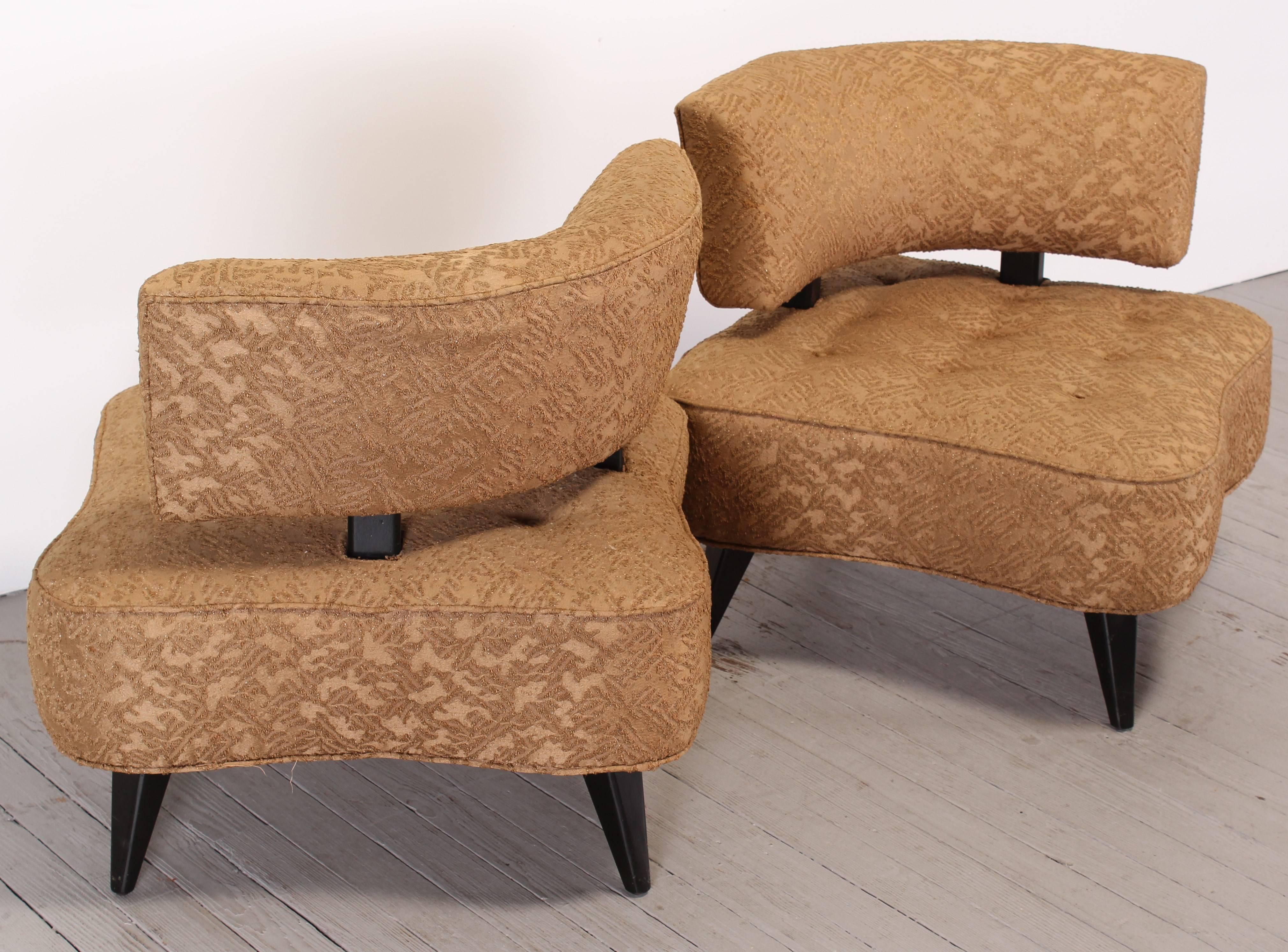 A very unique sculptural pair of James Mont style chairs, 1940. Dimensions found below. Seat depth varies depending on angle you are sitting in them which is 22