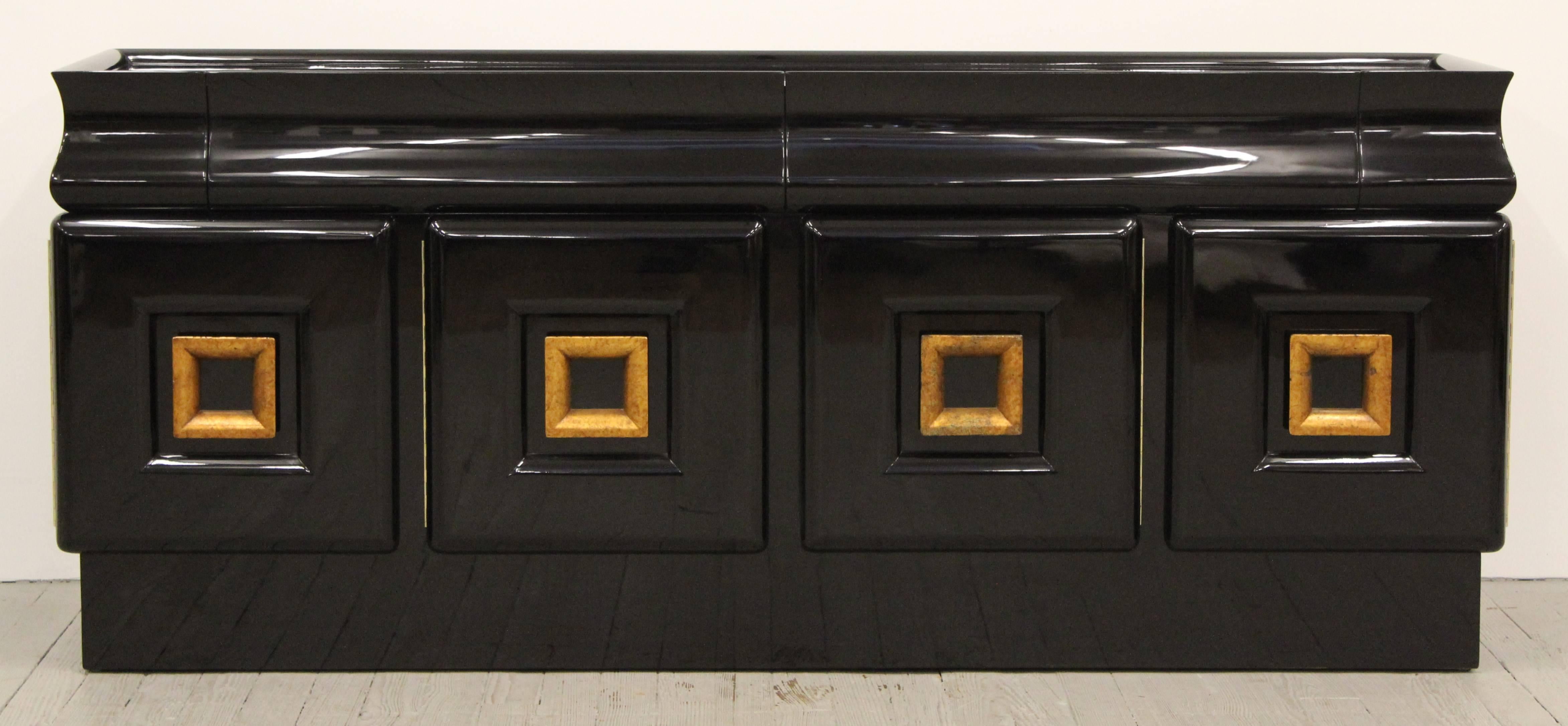 A gorgeous credenza signed originals by James Mont restored black lacquer finish with gold giltwood accent pulls. Stamped interior drawer Dynasty Inc. This fine credenza has two drawers across the front with inset top. Four doors across the bottom