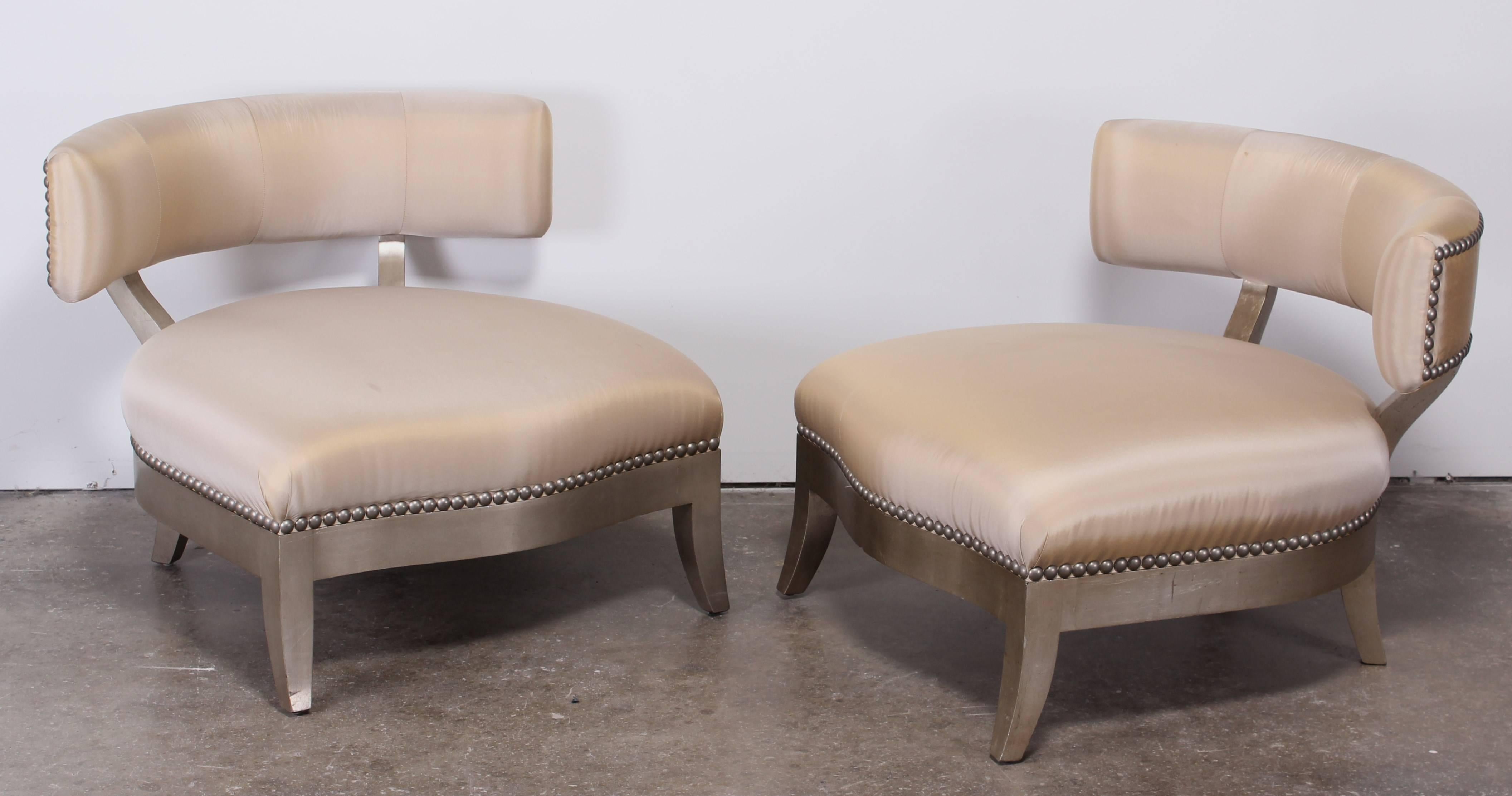 Pair of Marge Carson Santorini chairs. A stunning pair of Hollywood Regency silver leaf Marge Carson 