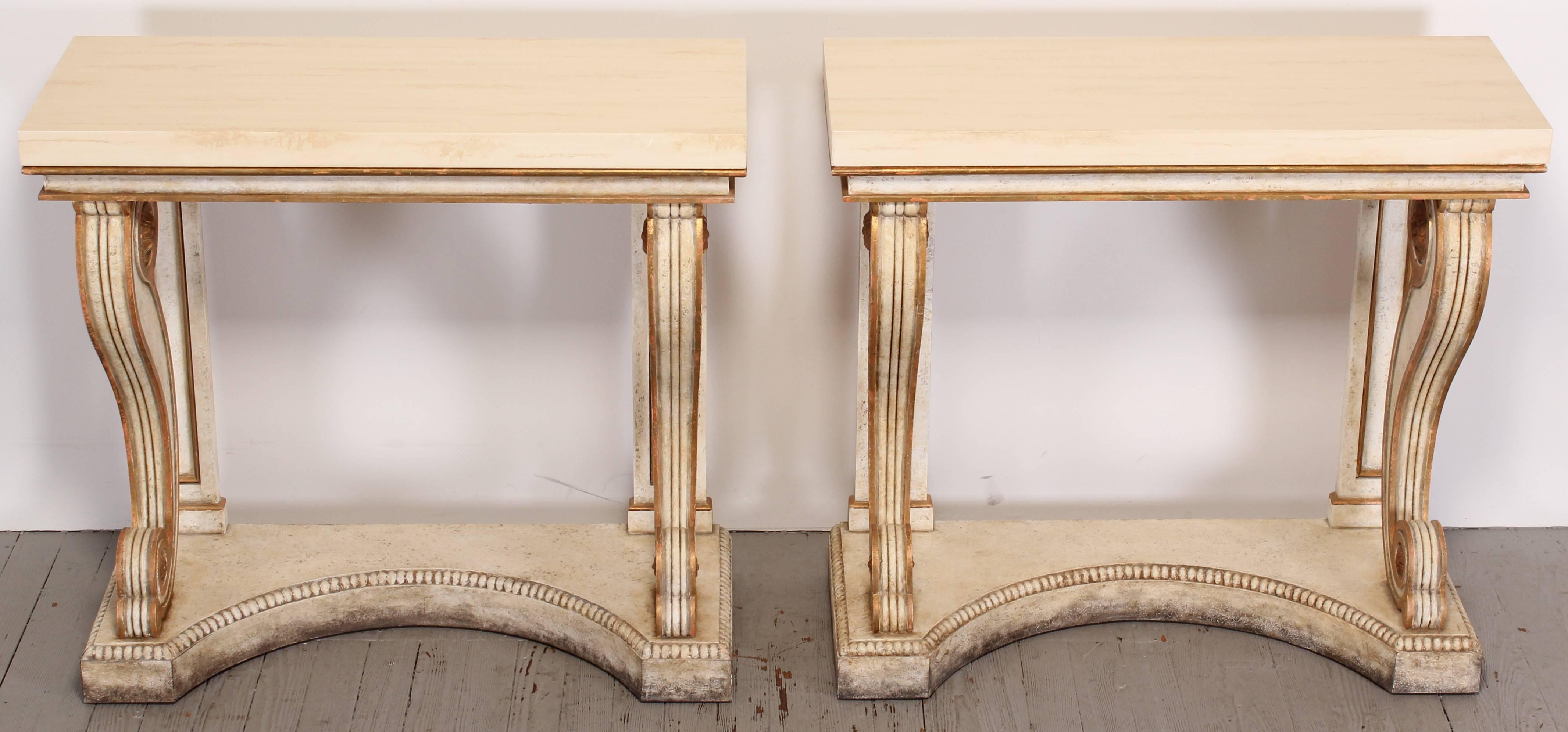 A pair of Neo-Classical Niermann Weeks Blenheim consoles done in Swedish white, Venetian red, gold gilt paint with a faux marble top. Retail price new for the pair of consoles is $18,000.  These unique consoles were created by the designer to look