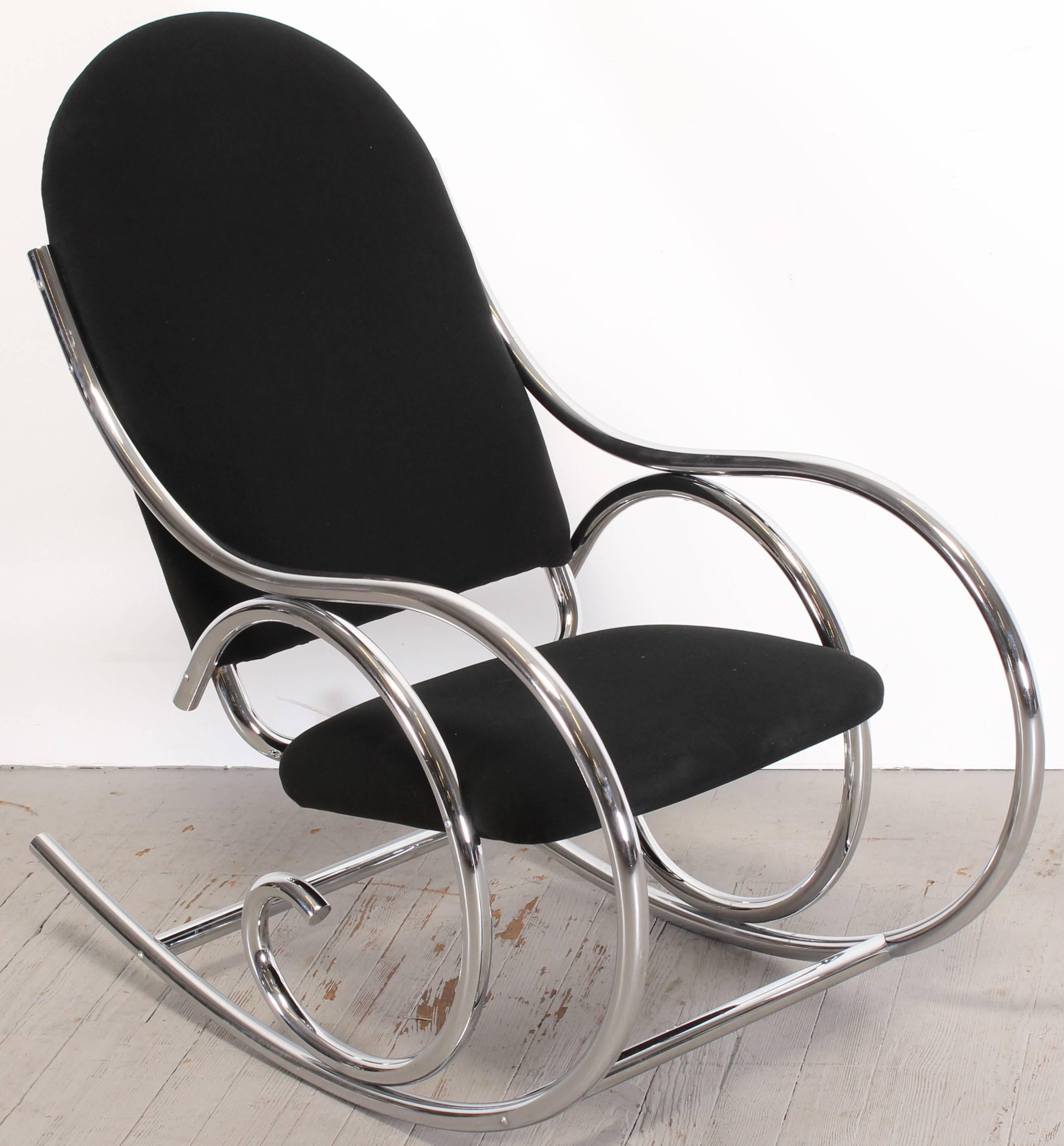Italian chrome rocking chair, probably upholstered and sold by Selig Manufacturing Co, retains original upholstery tag with license number that has been found on marked Selig pieces. There are similar chairs, it is obvious that this is a higher