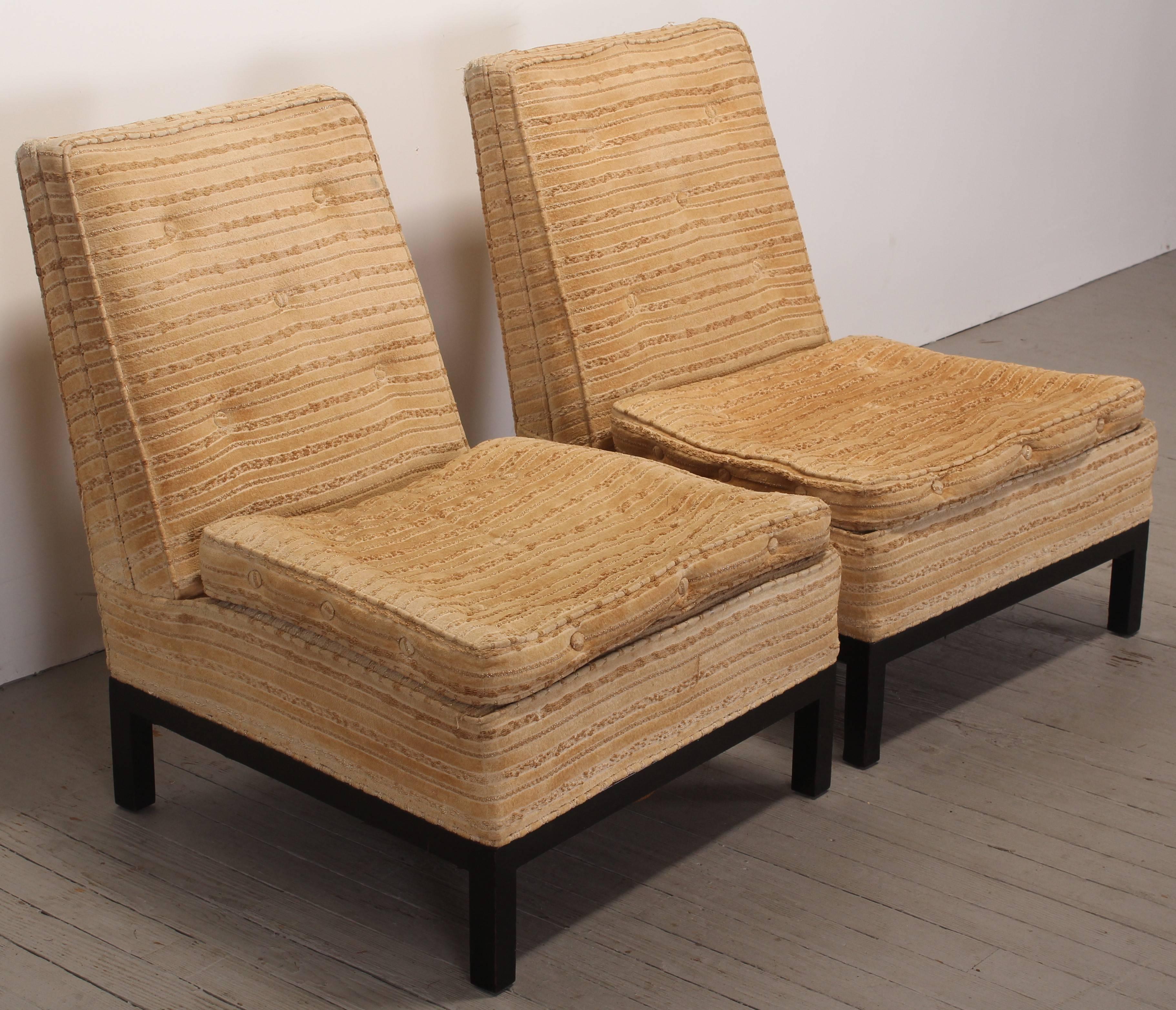 Rare pair of slipper chairs designed by Robsjohn-Gibbings for Widdicomb Furniture Co. Original upholstery which obviously needs to be replace, frames are solid, legs show some are as represented in images.