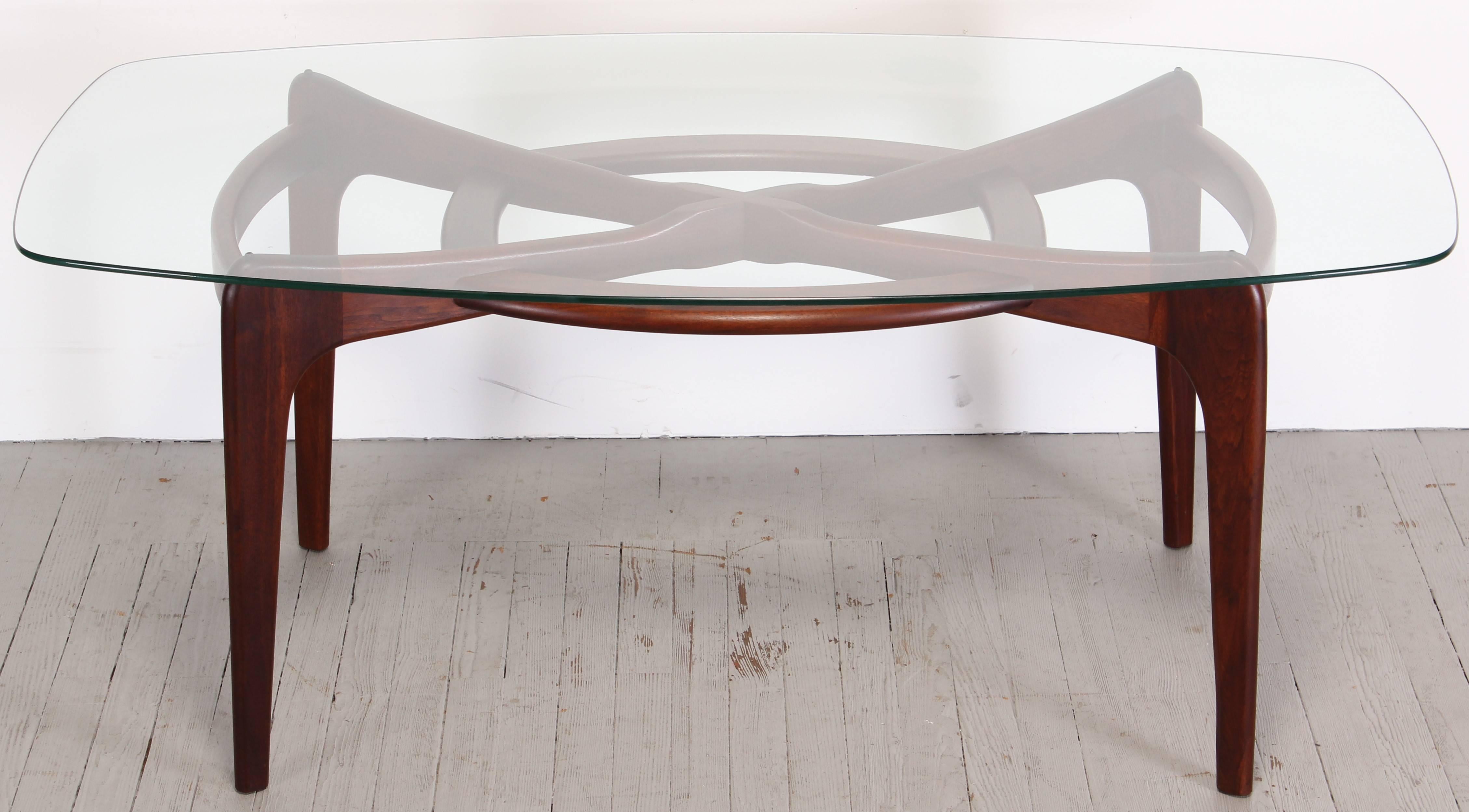 Adrian Pearsall walnut dining table for Craft Associates. The architectural form dining table is in original finish, structurally sound, original glass is in excellent vintage condition some scratches not major or distracting.
NYC and surrounding