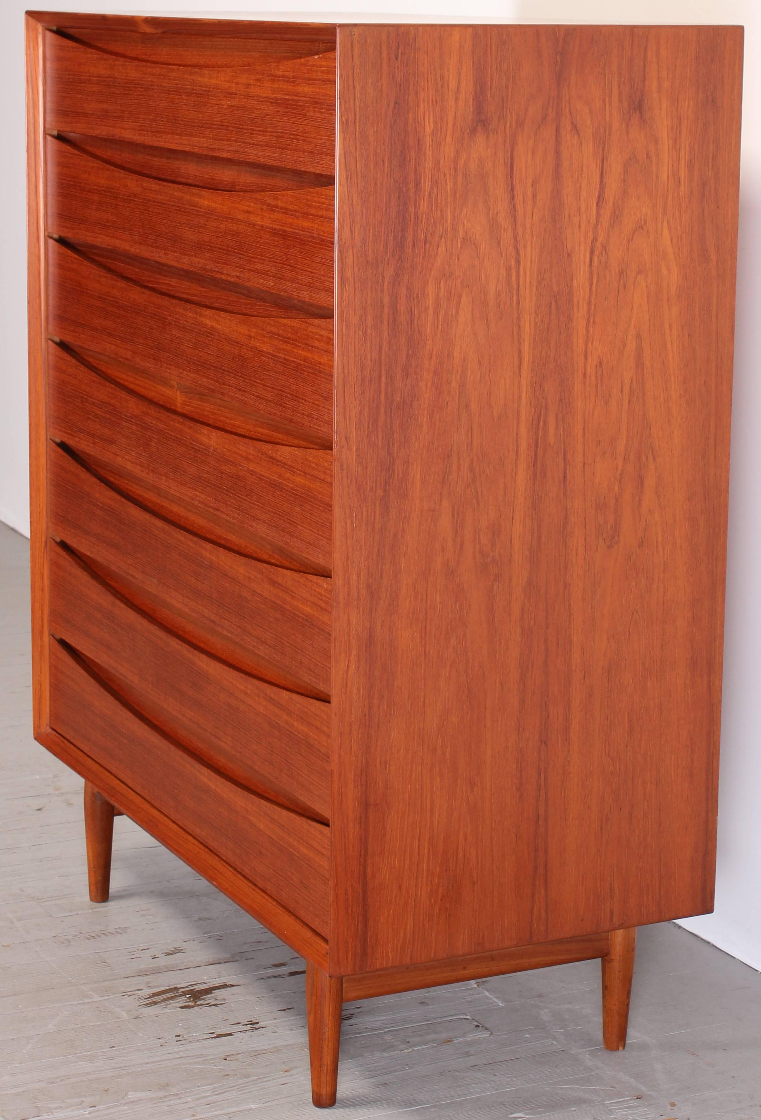 Arne Vodder designed seven drawer teak tall chest for Sibast of Denmark. The dresser is in excellent vintage condition, drawers slide nicely. The handsome,  soundly built bureau is ready to be used. 