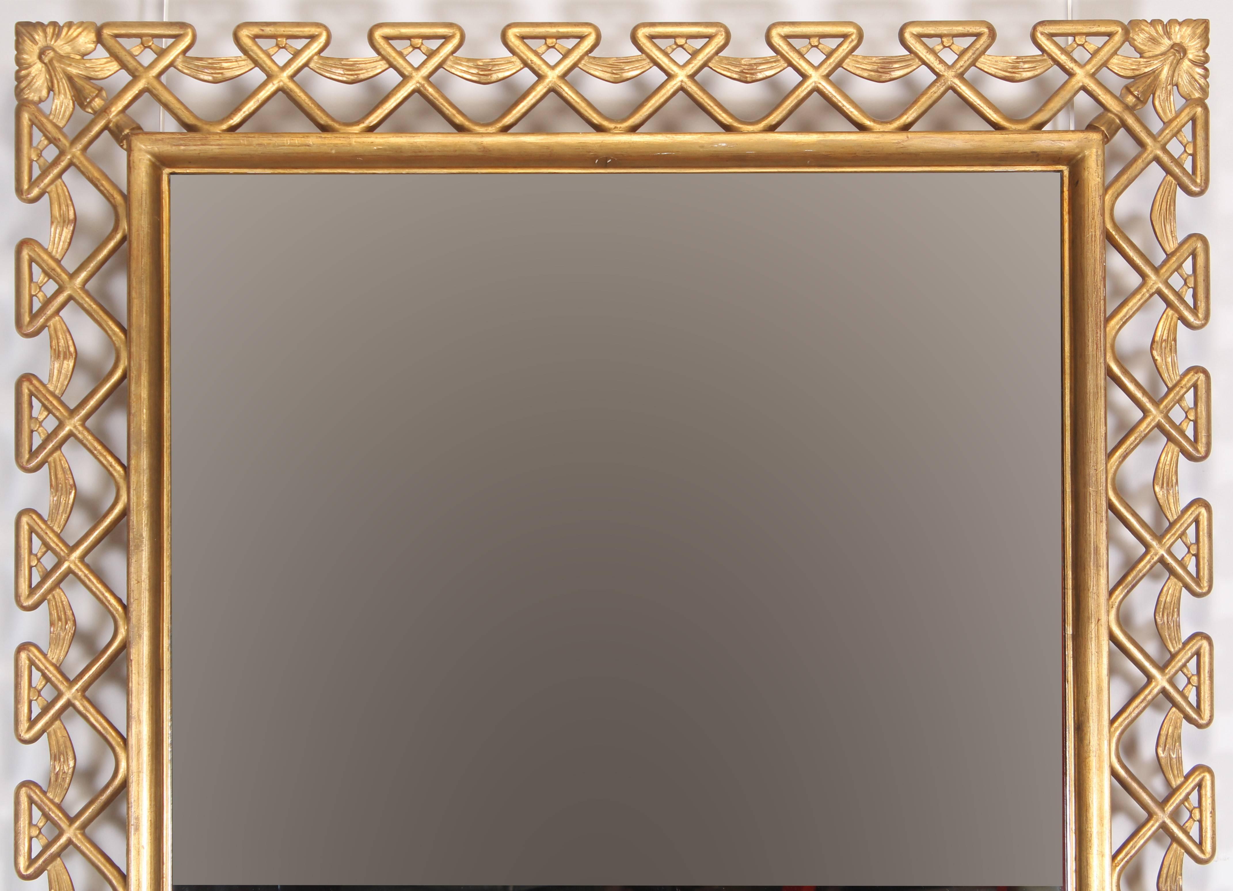 An all wood gilt frame with reticulated design of interwoven swags and loops, very unusual pattern. Frame has hanging rings already mounted to be used either vertically or horizontally.
The unique reticulated design offers a dramatic