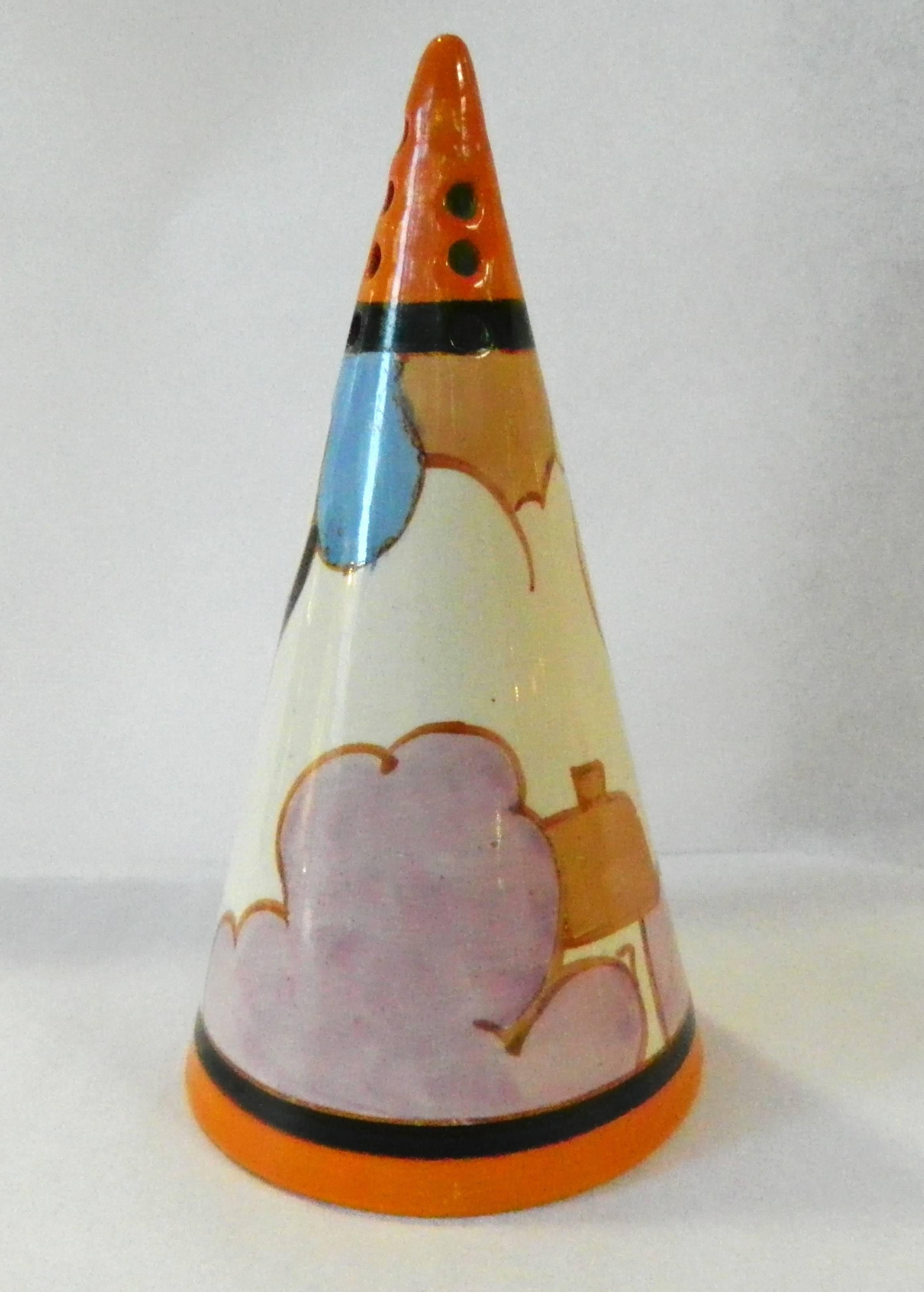 Original Clarice Cliff Fantasque orange conical sifter or shaker with a cottage under a group of colorful trees. It was done in the 1930s.