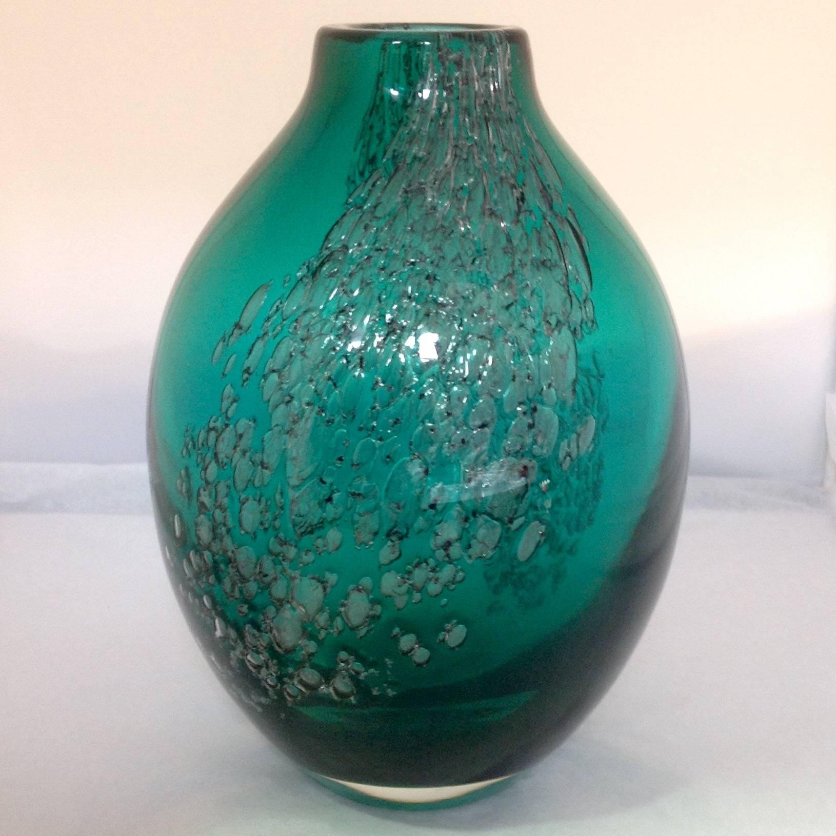 Emerald green glass vase by Maurice Marinot with random trapped air bubbles, 
French, 1882–1960.