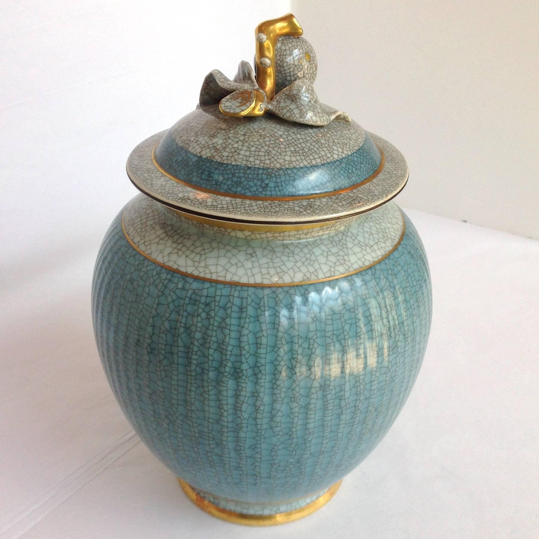 Large Royal Copenhagen ceramic vase by designer Thorkild Olsen in aqua and white with a craquellure glaze with gold trim. Made in Denmark circa 1940s.