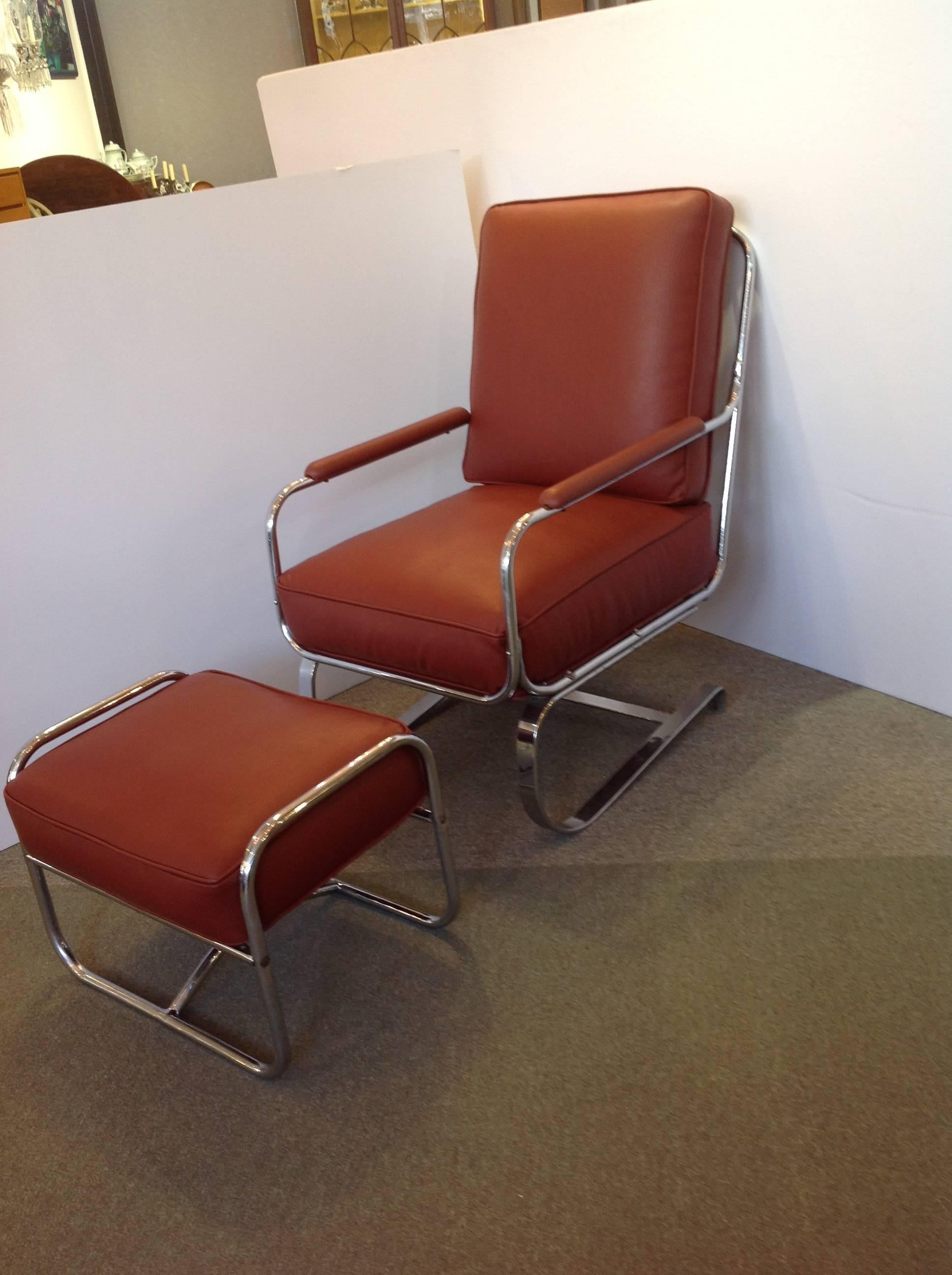 Rare Springer armchair and ottoman with a cantilever tubular chromed steel frame. It was designed by kem Weber for LLoyd manufacturing. The base is heavy and the newly upholstered faux leather covered cushions are substantial.
 