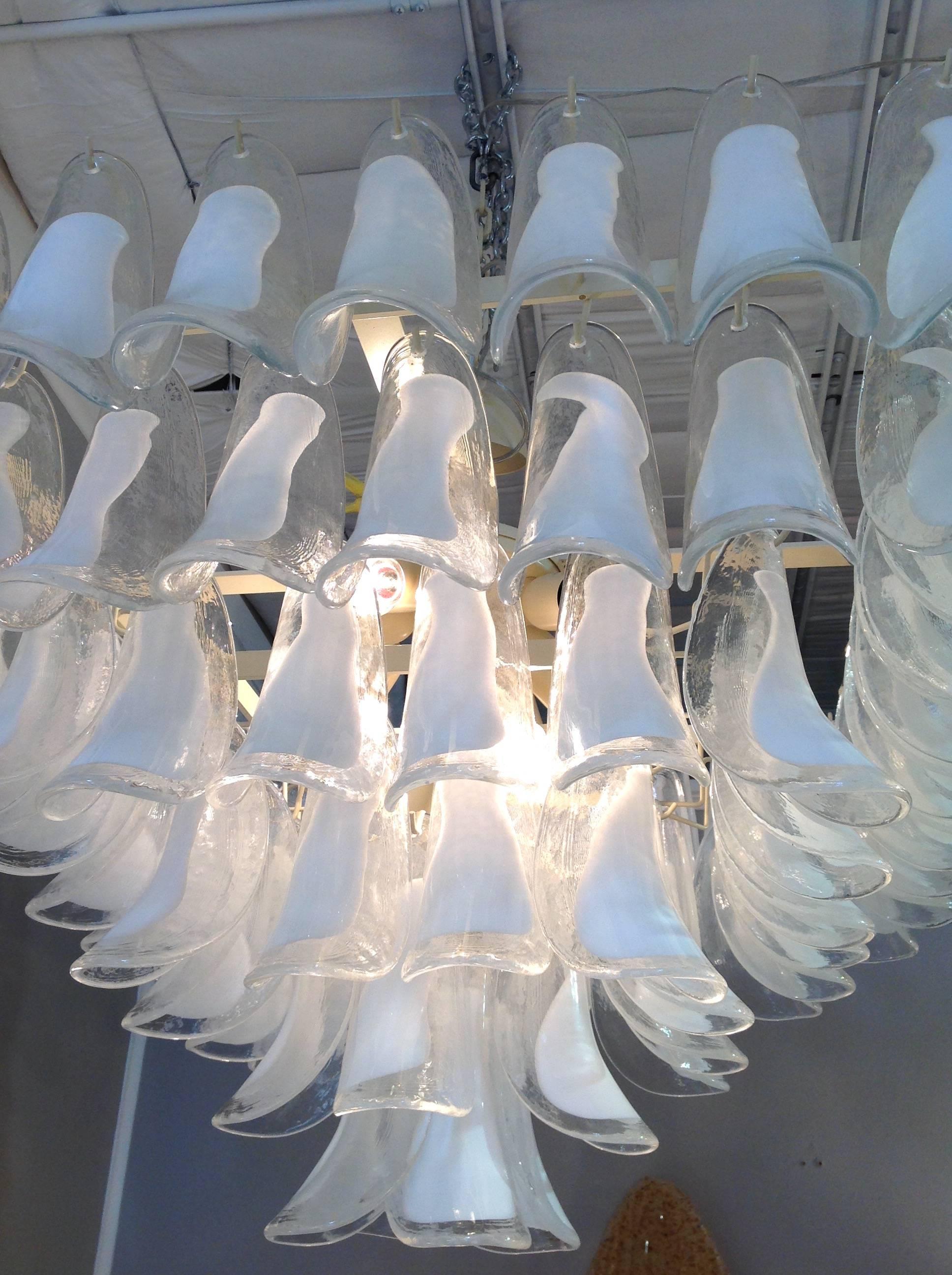 Large square Mazzega petal seven-light chandelier. There are handblown white to clear petals on ivory metal frame. Made in Italy, circa 1960.
 