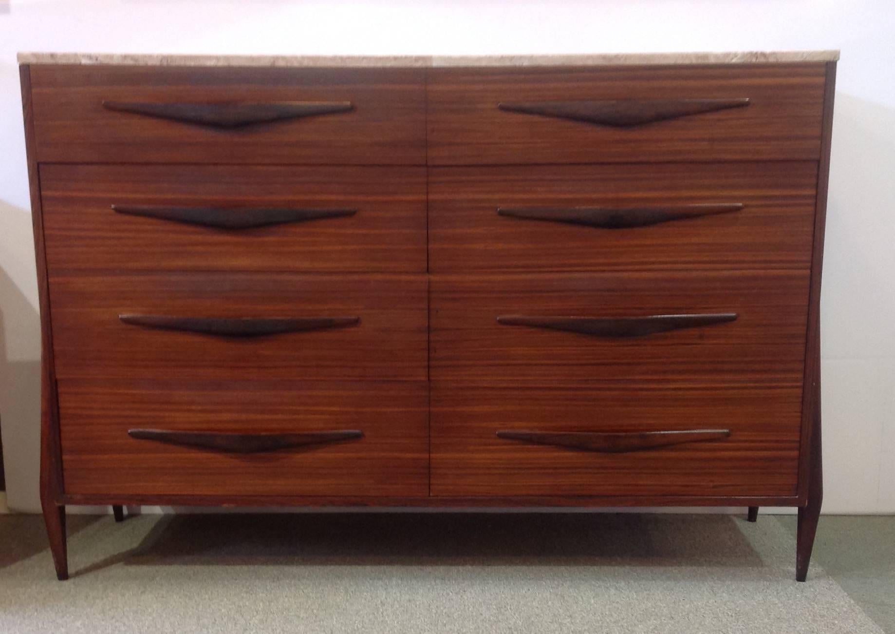 Mid-Century Modern chest of drawers with eight large drawers and a replaced cultured marble top. It was made by Pallagi in Hungary, circa 1960.