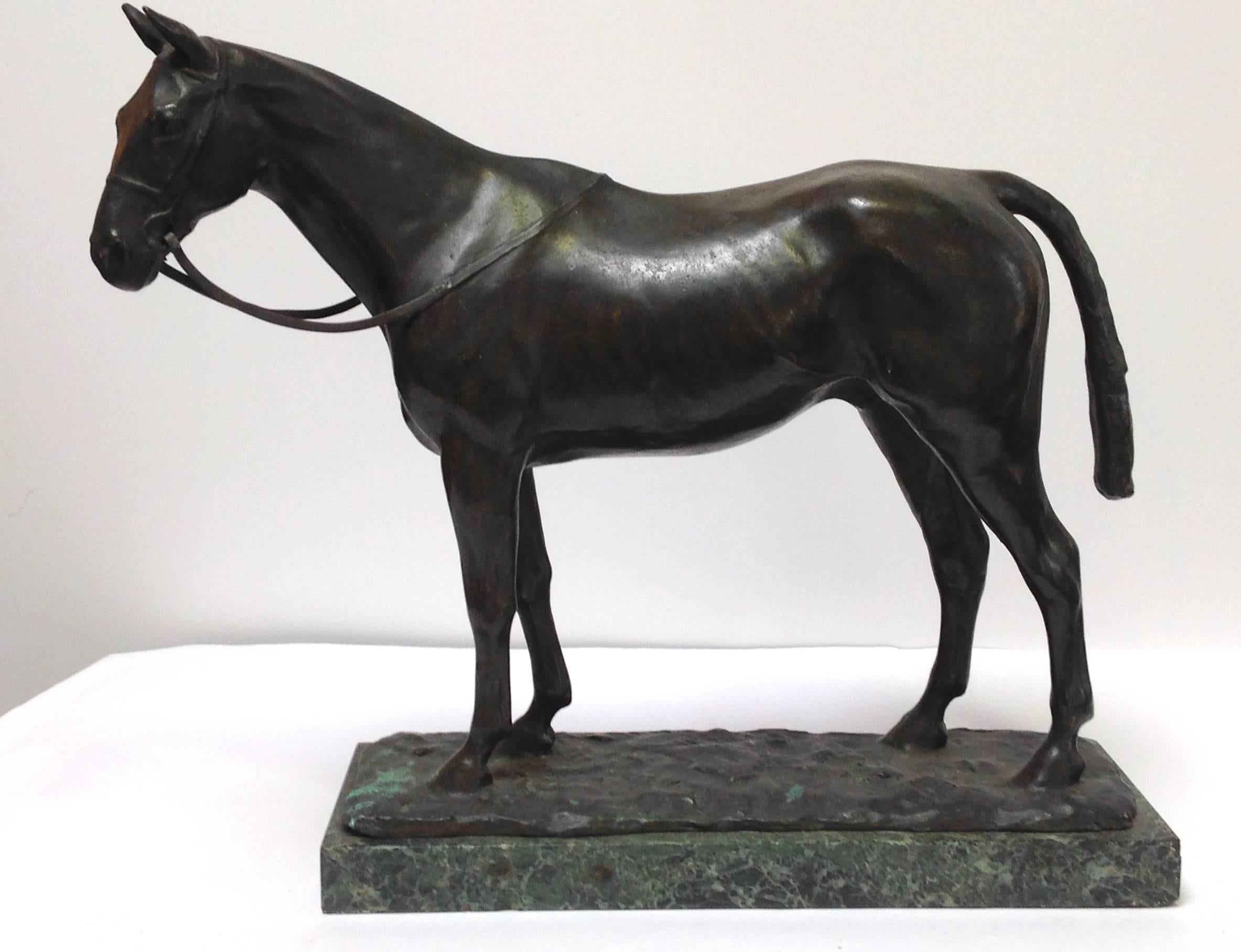 A cast bronze sculpture of Master Robert, the 1924 grand national winner
by Pauline Boumphre. The race was at the Aintree Racecourse in Liverpool, England.