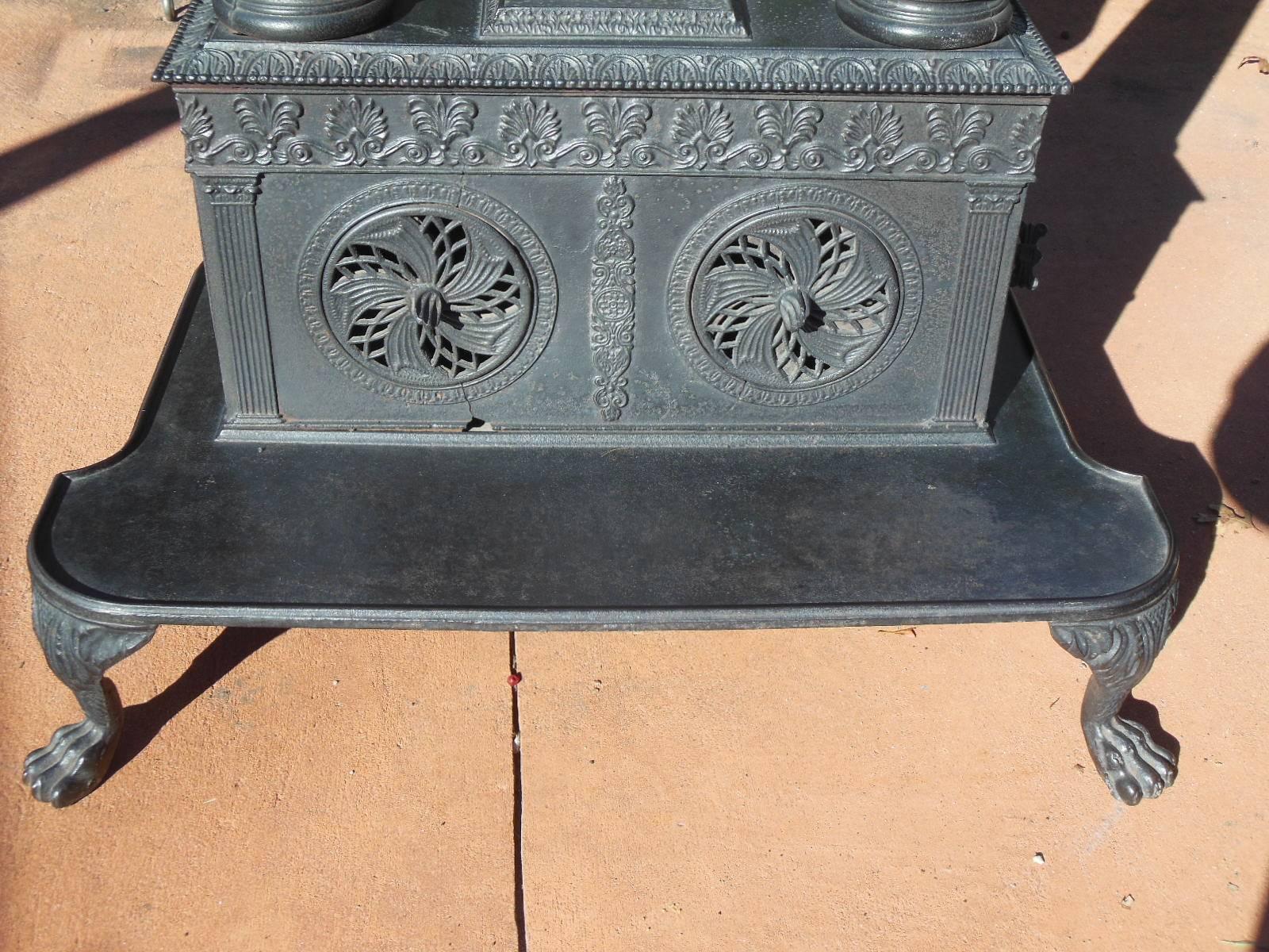 This most elaborate four column cast iron stove is attributed to "James Wager Troy NY 1840-43". The Albany Institute of Art has a large collection of these 
Ornate parlor stoves that were made in the Albany area. Tammis Groft former