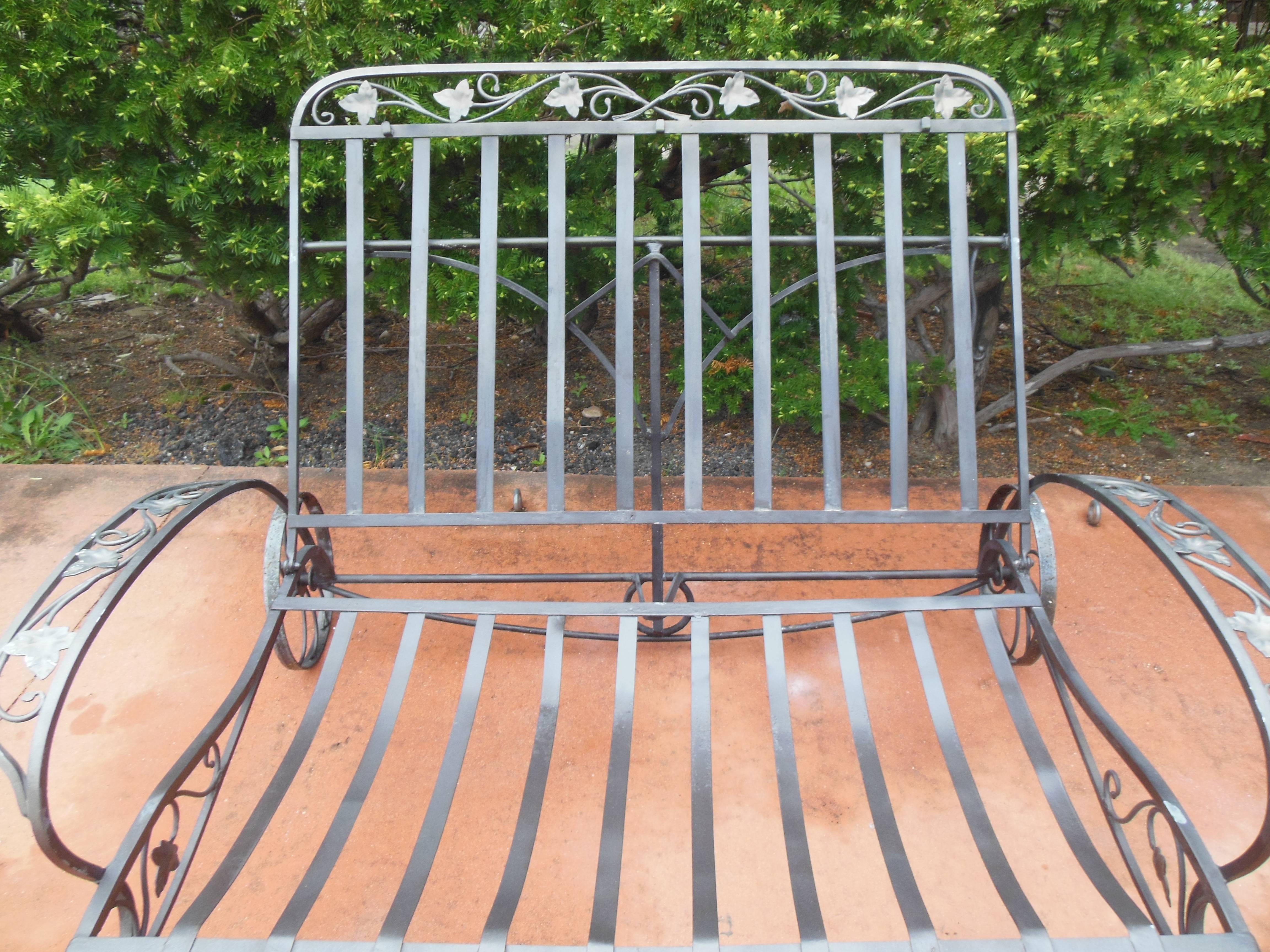 This is a genuine wrought iron double chaise by Salterini in the Mt Vernon pattern. Please ask to see a xerox from the Salterini catalog of the chaise that 
documents authentication. This Mt Vernon Double chaise is from an extensive.
Salterini