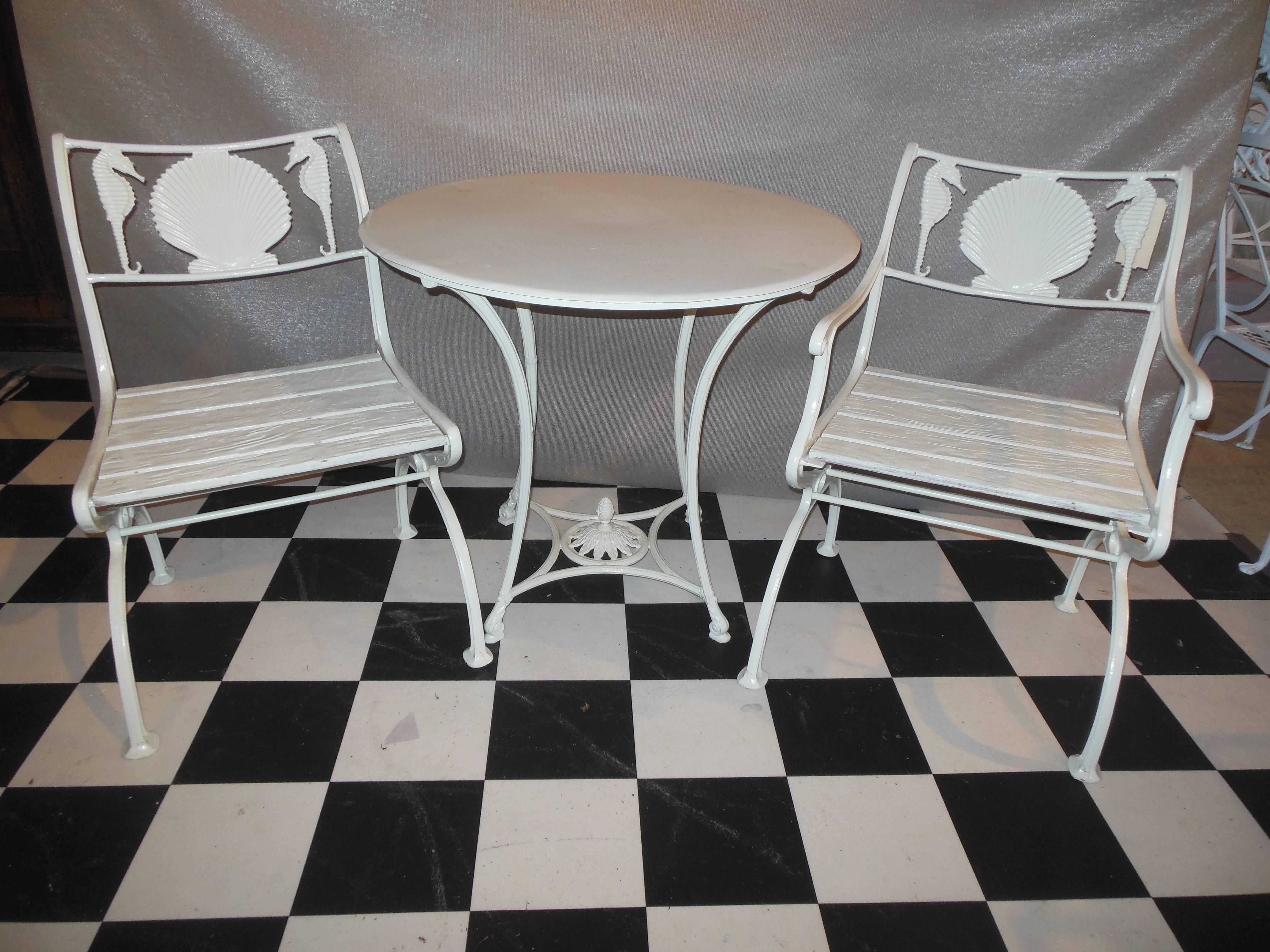 Early 20th Century Bistro Set, Cast Iron Table and Chairs with Shell & Sea Horses For Sale