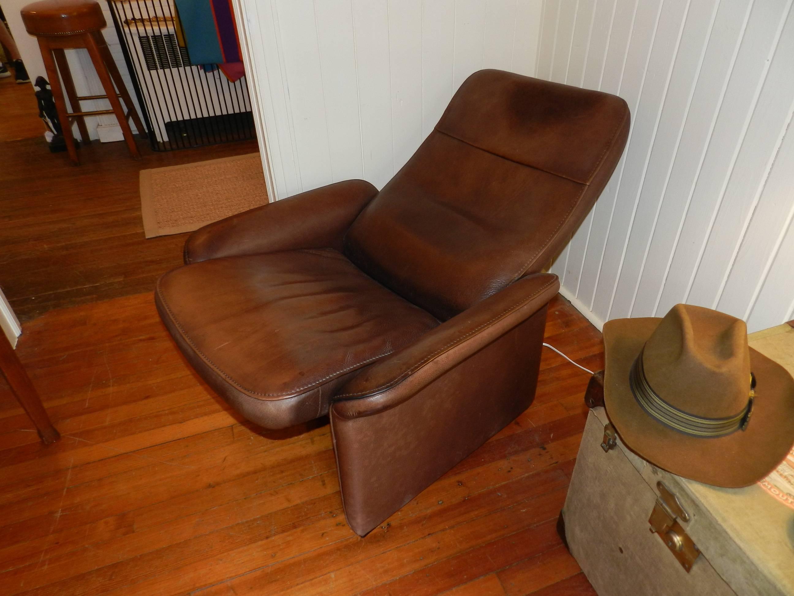 1970s leather recliner by De Sede of Switzerland with beautiful warm patina.