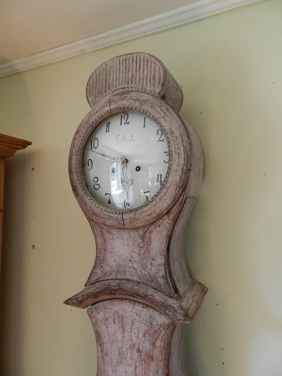 This is an antique Gustavian Moro clock with painted enamelled face bearing the maker's name of 