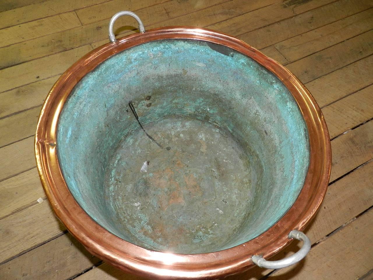Antique solid copper bucket with two carrying handles. Ideal for logs or kindling.