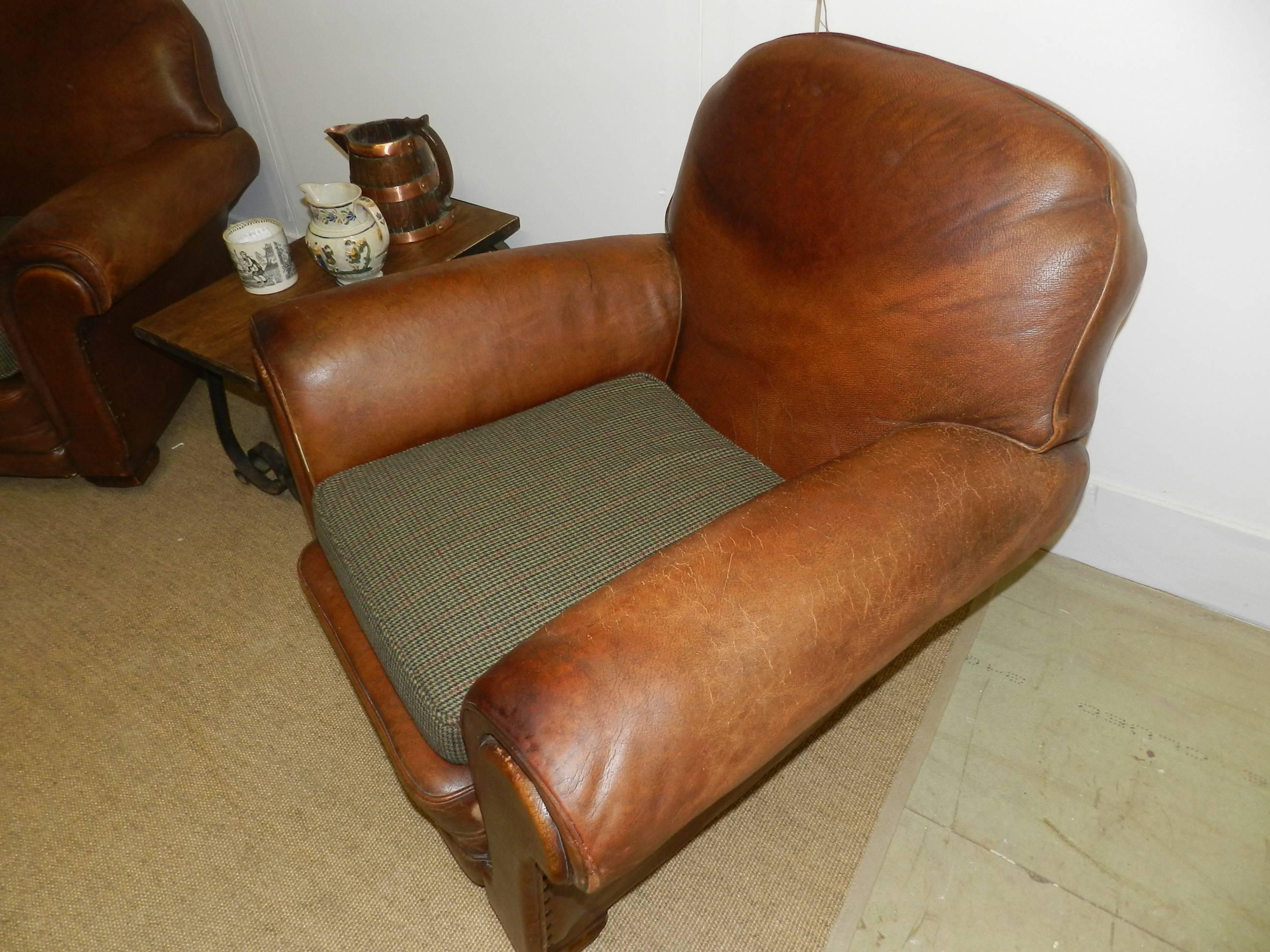 British Colonial Pair of Leather Club Chairs