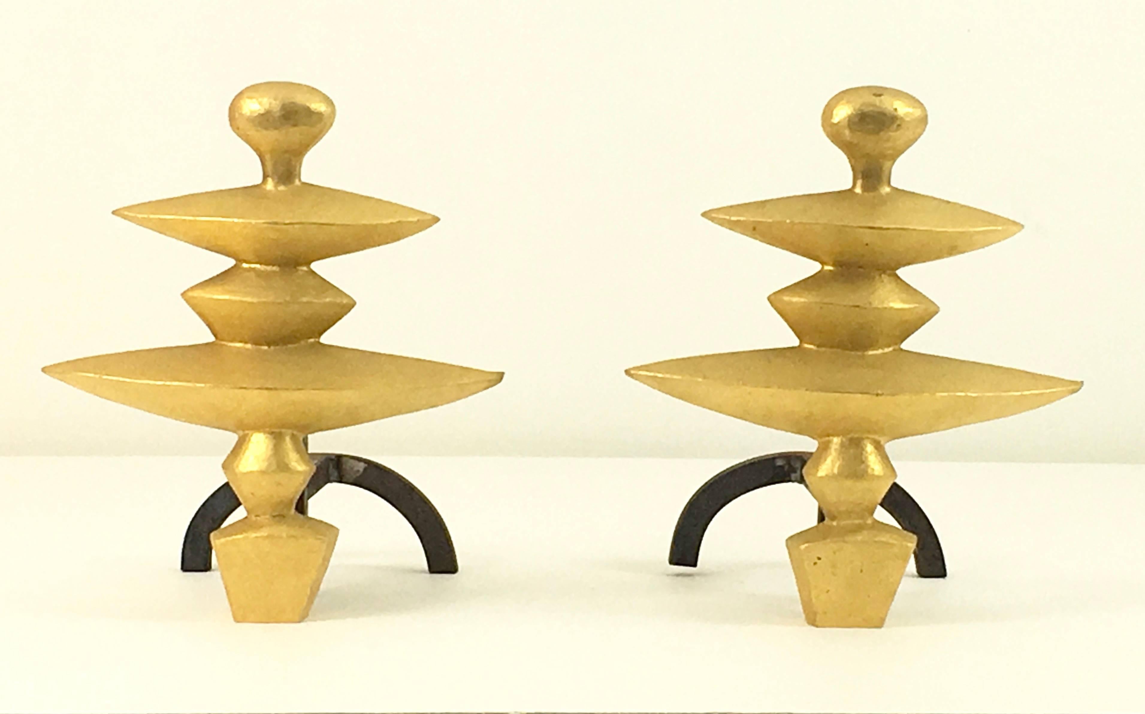 A rare pair of andirons designed by Alberto Giacometti for the Nelson Rockefeller collection. Stamped on verso.