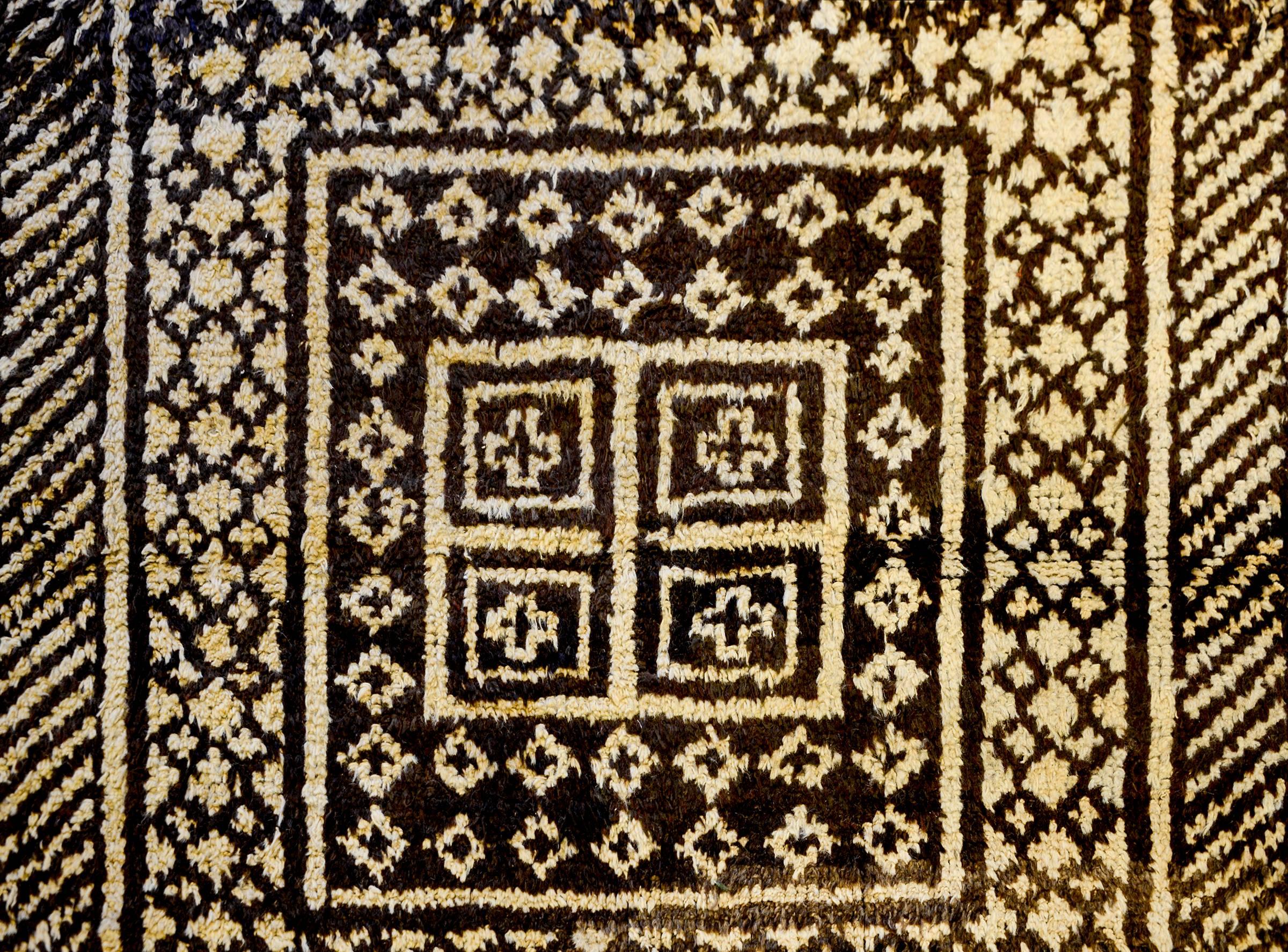 A fantastic 19th century Persian Gabbeh rug with an amazing composition of geometric patterns including diamonds, squares, zigzags, checkerboards and stripes, all woven in natural undyed wool.
