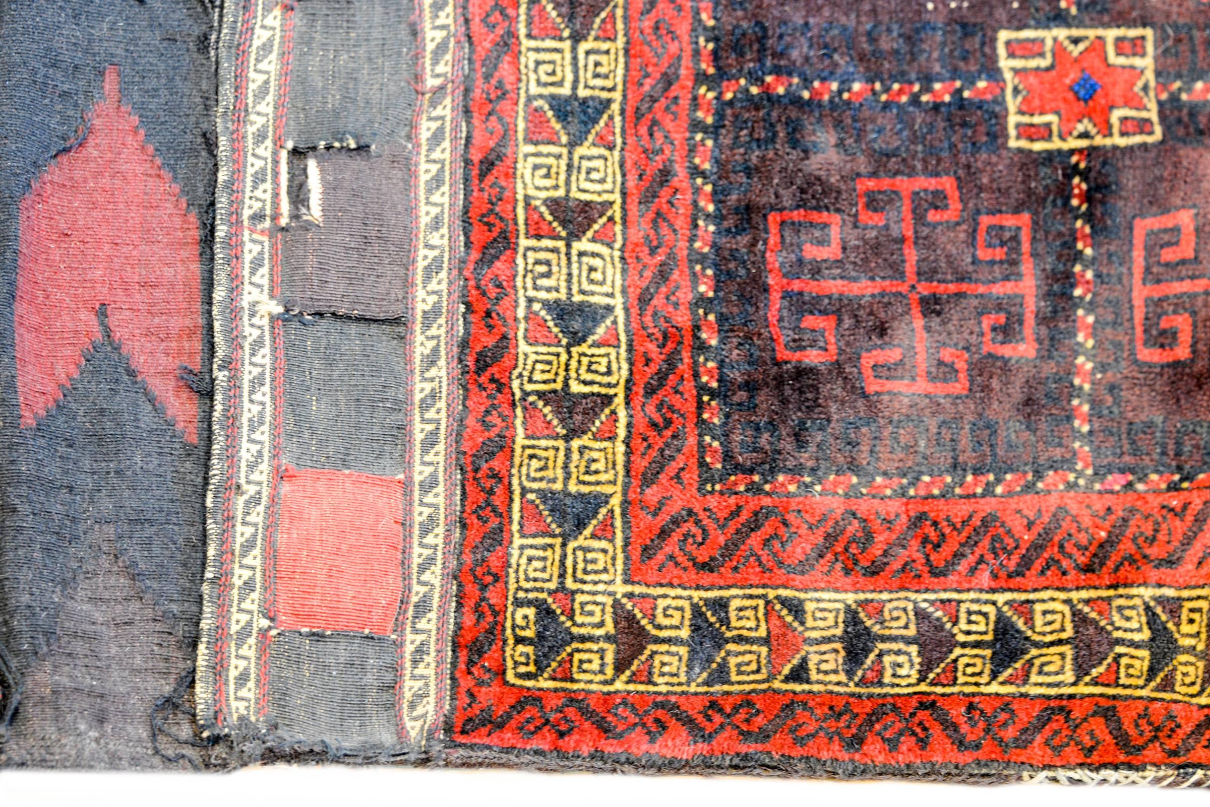 Kilim Merveilleux sac à main Baluch Saddle Bag du début du 20ème siècle en vente