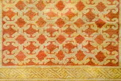 Insolito tappeto Khotan dell'inizio del XX secolo