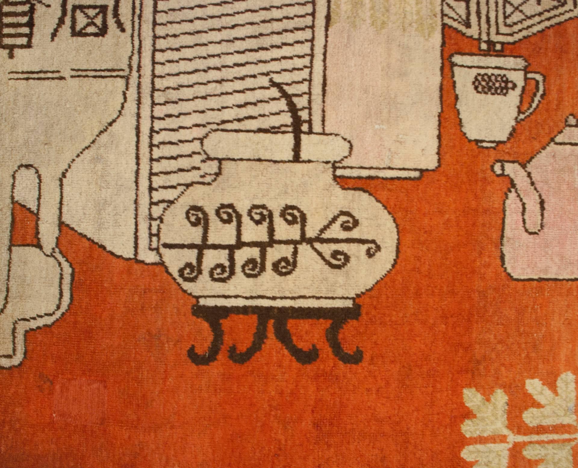 Ein wundervoller und kräftiger zentralasiatischer Khotan-Teppich aus dem frühen 20. Jahrhundert mit wunderschönen buddhistischen Symbolen, der für den chinesischen Markt bestimmt war. Zu den Details gehören ein reichhaltiger kakifarbener Hintergrund