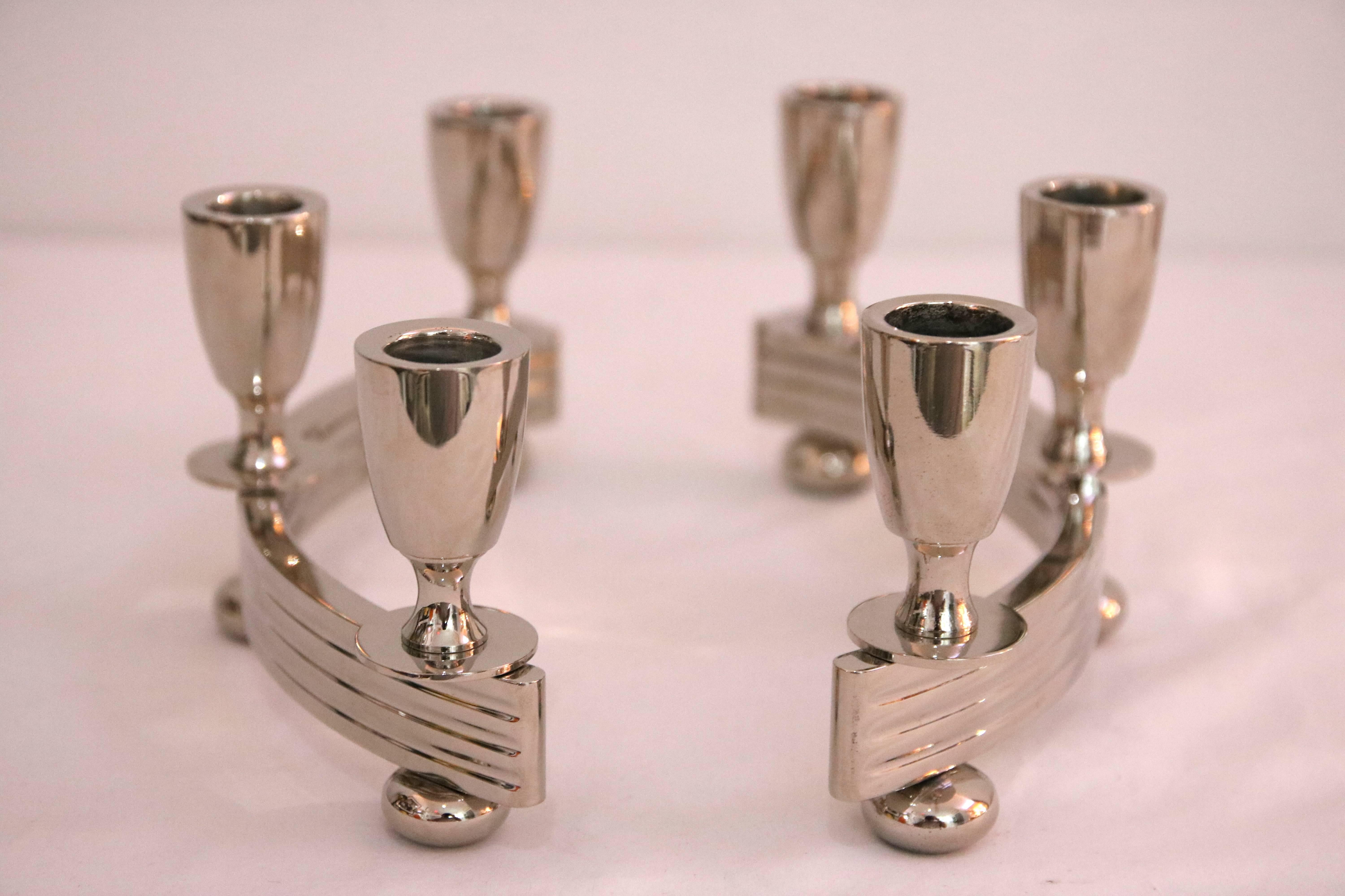 This stylish pair of Art Deco candle holders have recently been plated in nickel and were produced by the American firm of Dirilyte in the 1930s-1940s.

For best net trade price or additional questions regarding this item, please click the