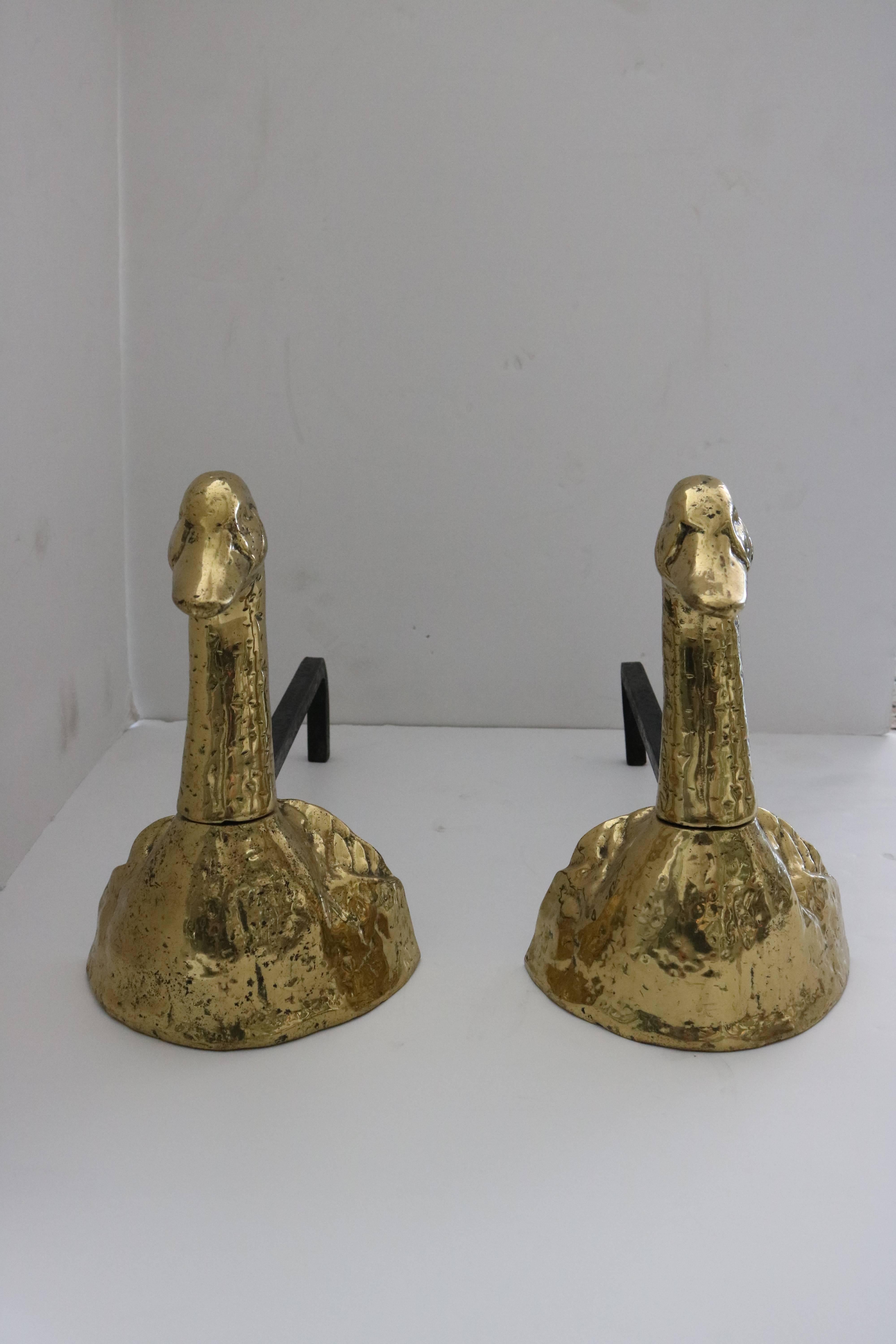 This handsome set of andirons date from the 1940s and are cast brass with Mallard duck forms. The pieces are highly detailed with a naturalistic chasing details.

Note: The heads can turn 360 degrees.

Please feel free to contact us directly for