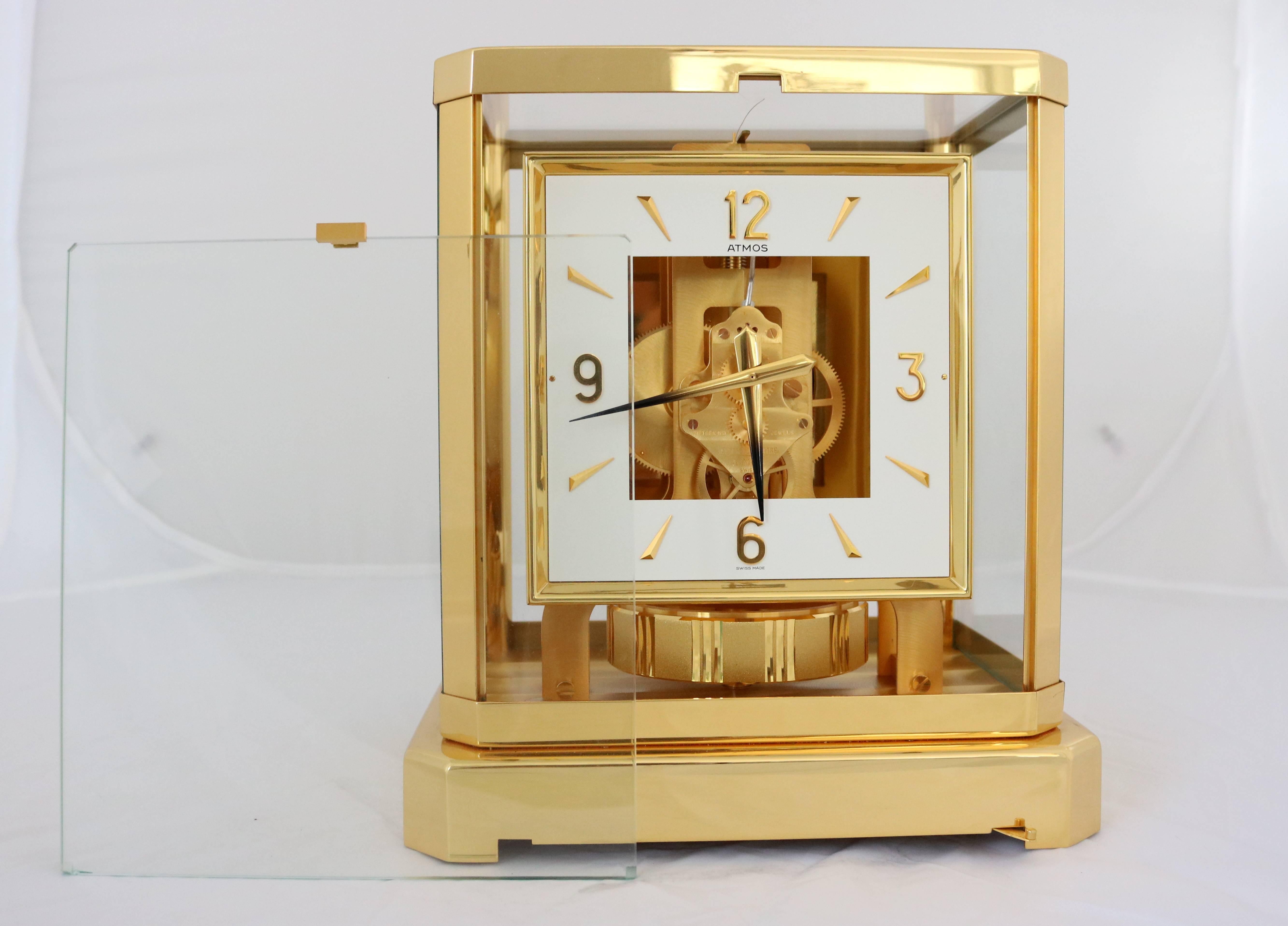This gold-plated Atmos Classique clock has the rare square-face enameled dial and is in immaculate condition as the piece has been in storage since it was purchased sometime in the mid-20th century.

FYI...
Jaeger-LeCoultre's Atmos 

Atmos is