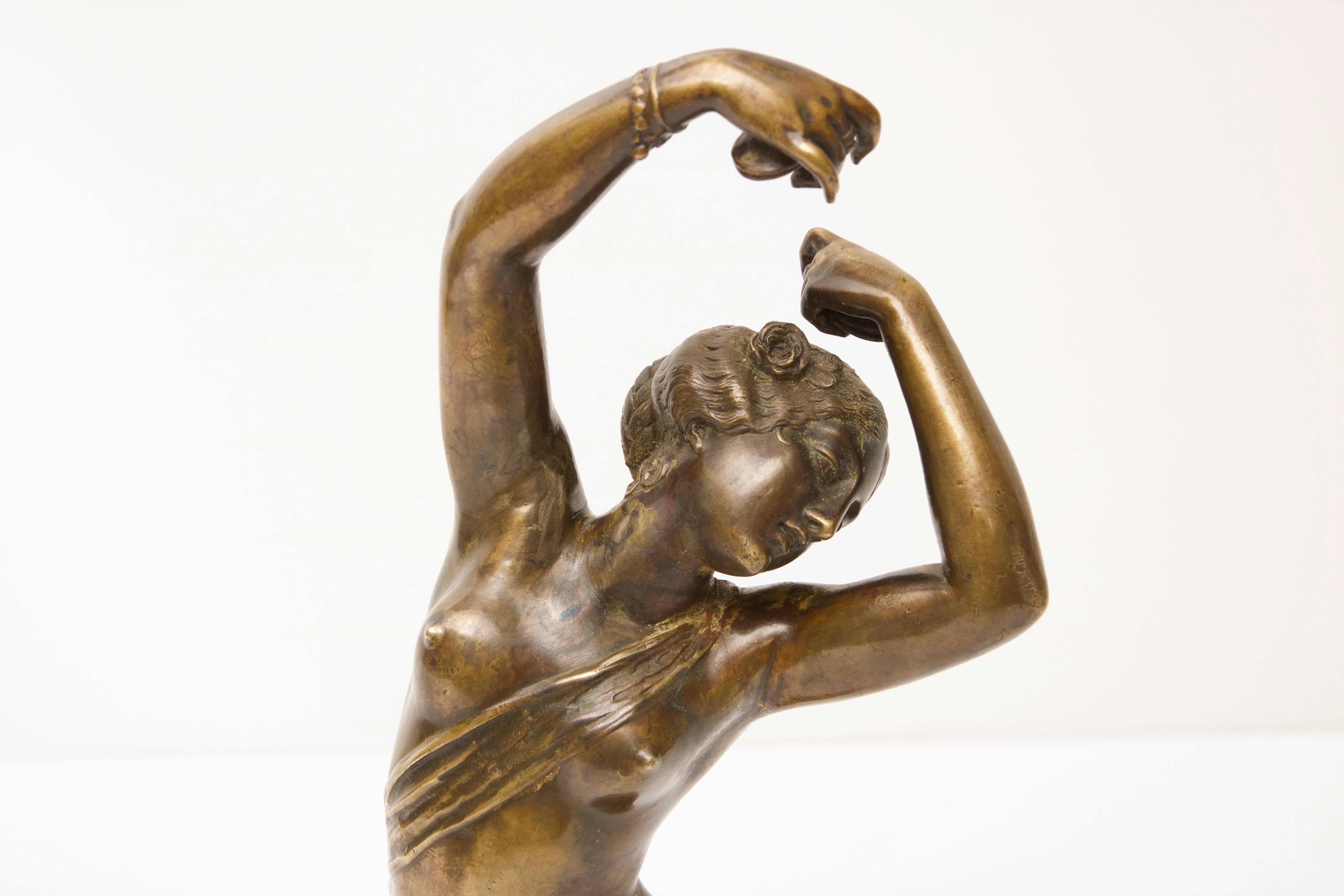 This beautiful and sensual sculpture was created in the late 19th century during the Epoch Art Nouveau by the French sculpture Louis Kley (b1833-1911). Here Kley has captured the female form in dance and grace as she surrounds herself with the