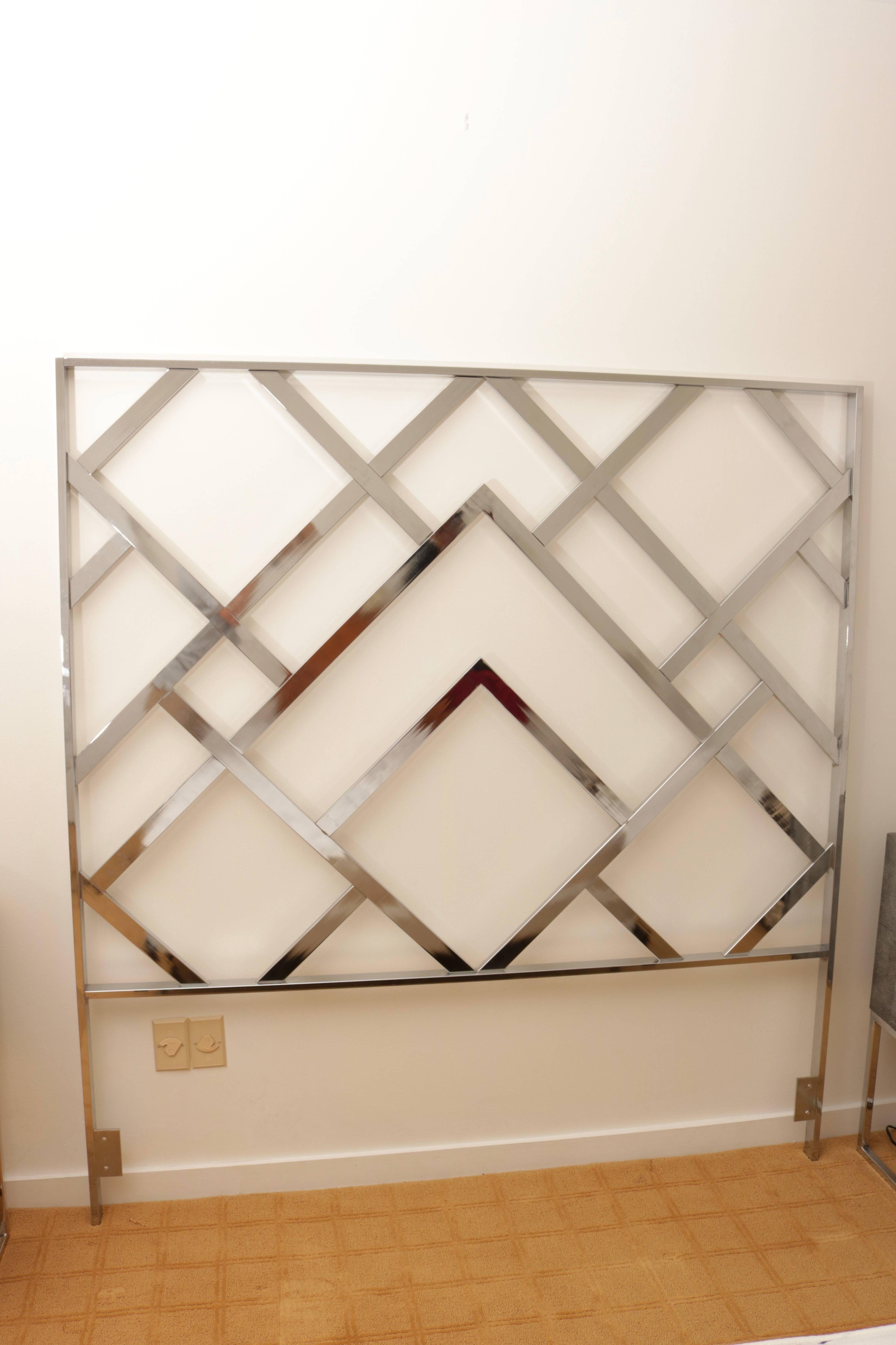 This stylish fret-work-pattern headboard was designed by Milo Baughman for D.I.A. and will make a statement in your bedroom. The lines of the piece are taken from the Art Deco period of the 1920s and 1930s and work seamlessly in today clean modern