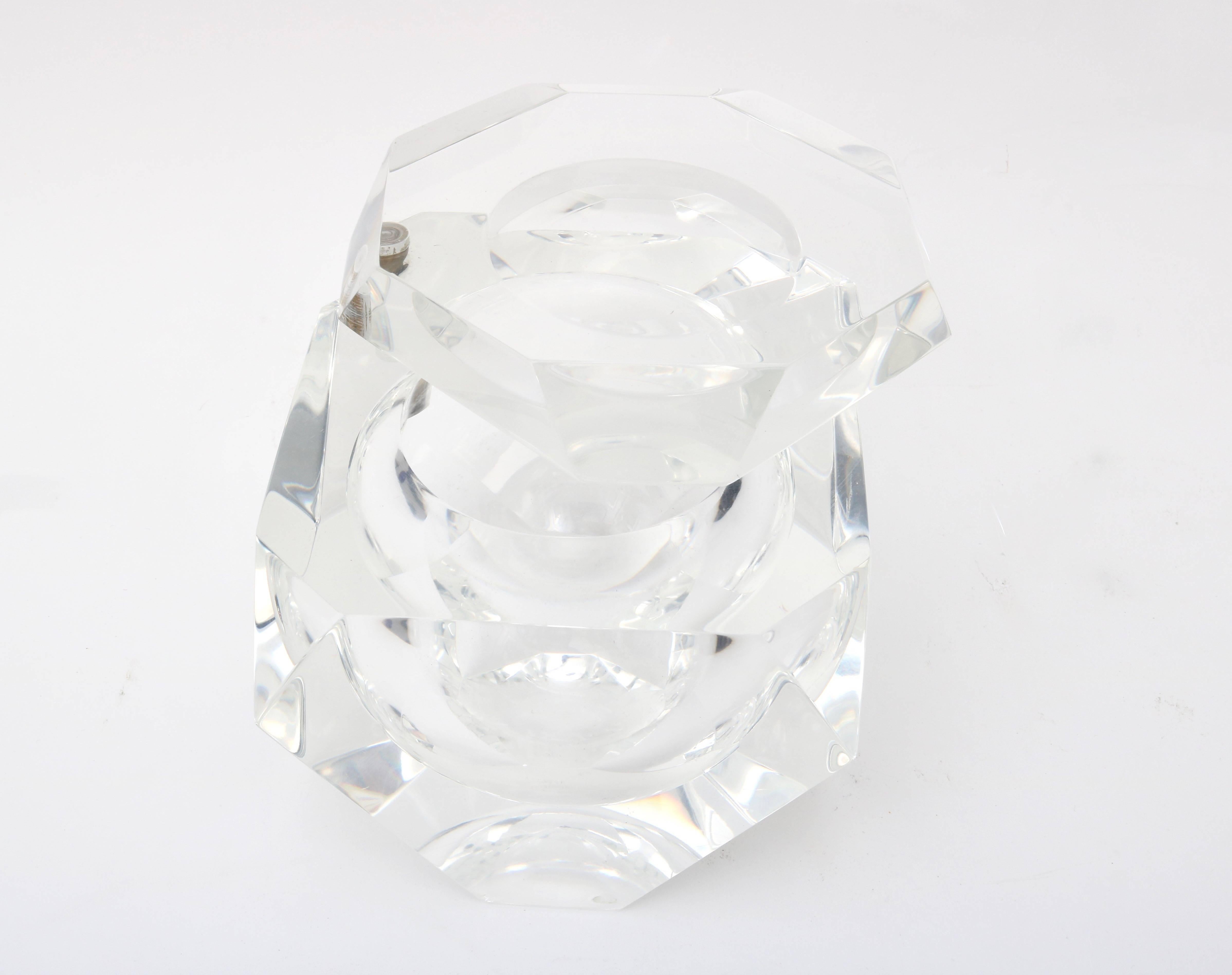This stylish ice bucket was originally purchased at the Alessandro Albrizzi shop in Palm Beach sometime in the 1970s. It is the perfect size for two and its faceted gemlike shape catches the light beautifully.

The pivoting top makes for ease of