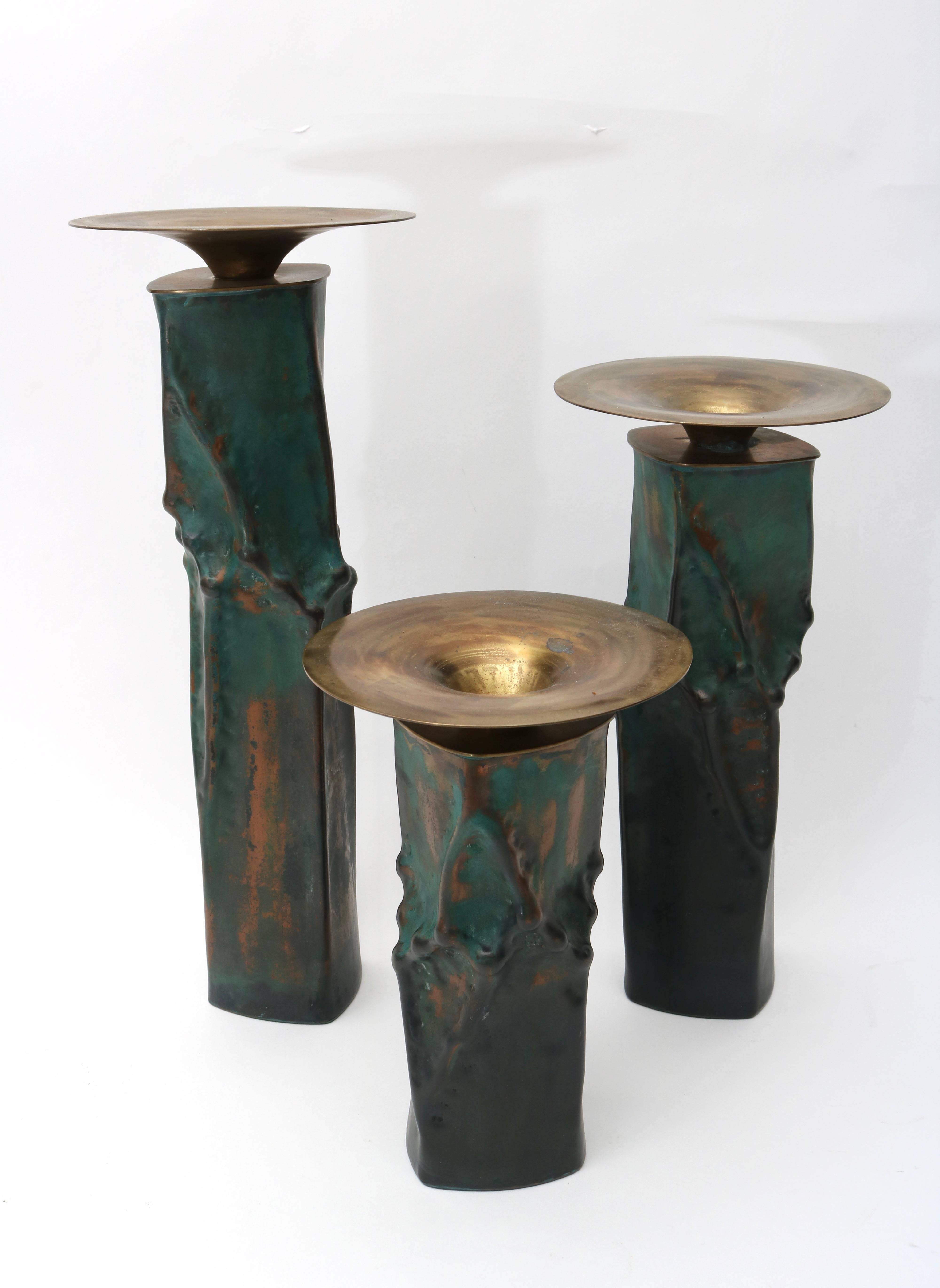 This set of three candleholders are by an American firm but unfortunately the incised signature is illegible (see underside photo #10). They are fabricated in copper and brass and which was the perfect choice for their Brutalist form and