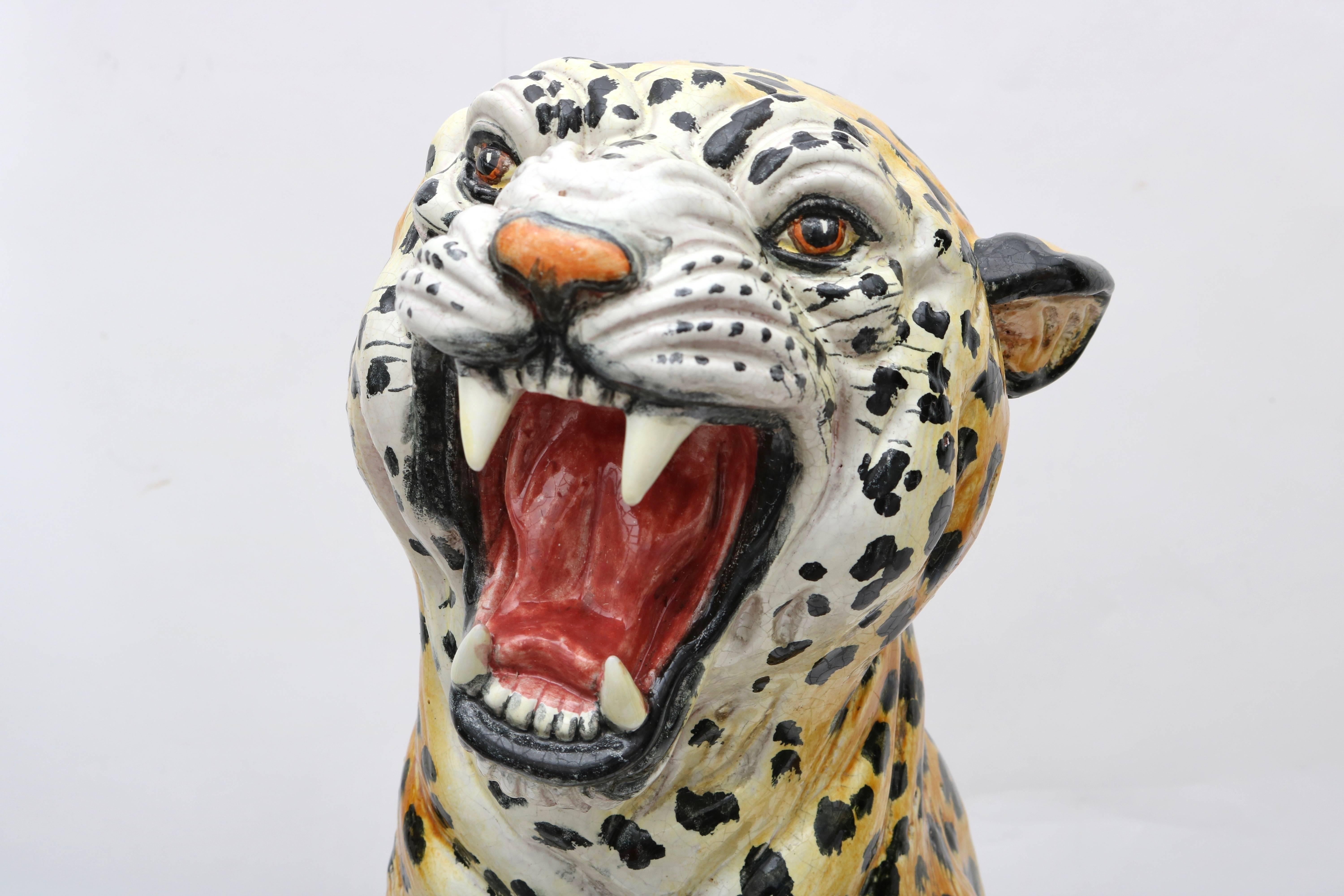 This stylish and chic Italian, glazed terra cotta figure of a leopard was acquired from a Palm Beach estate and the piece dates to the 1970s-1980s.

