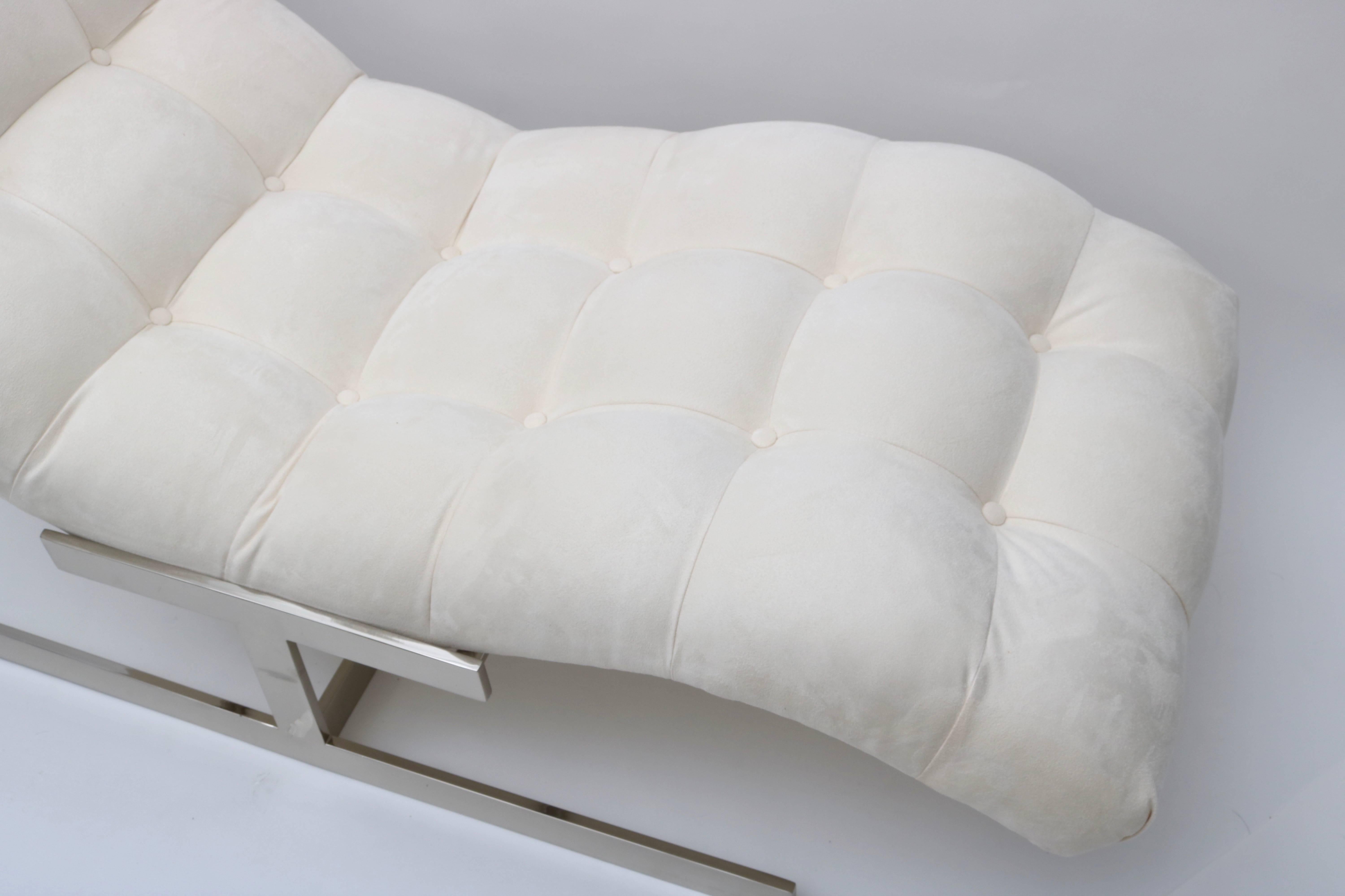 This stylish "Wave" chaise was designed in the manner of Milo Baughman for his flat-bar collection and has recently been professionally rebuilt and upholstered in white ultra-suede.

For best net trade price or additional questions